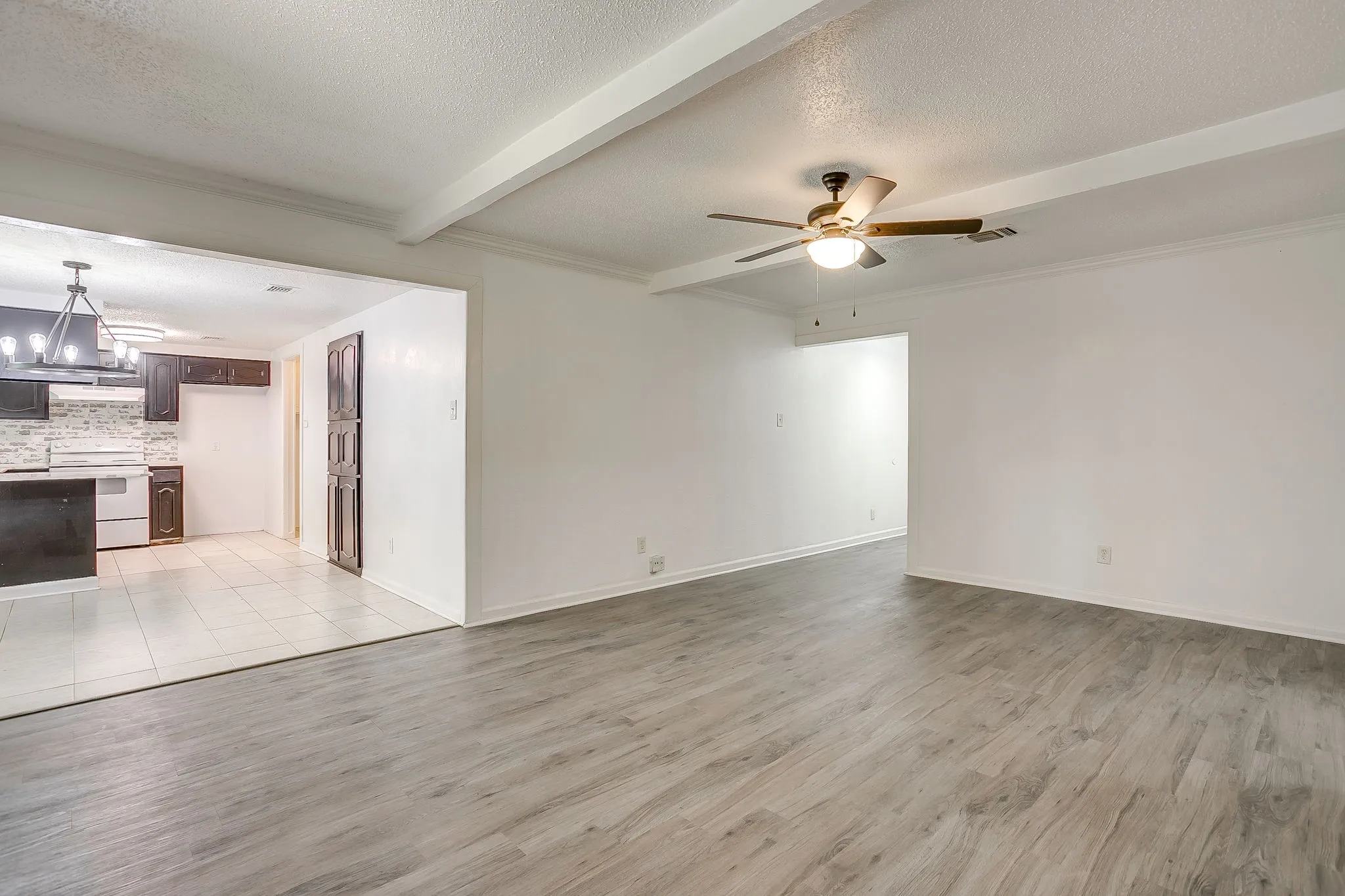 Open to dining area and kitchen