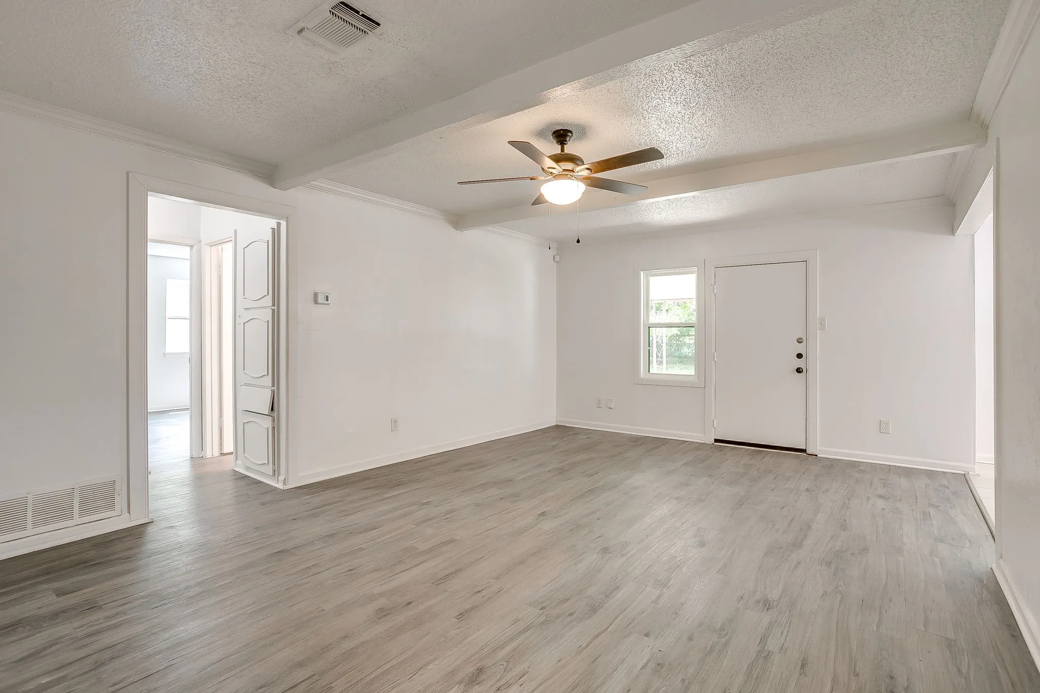 Living room with vinyl wood flooring
