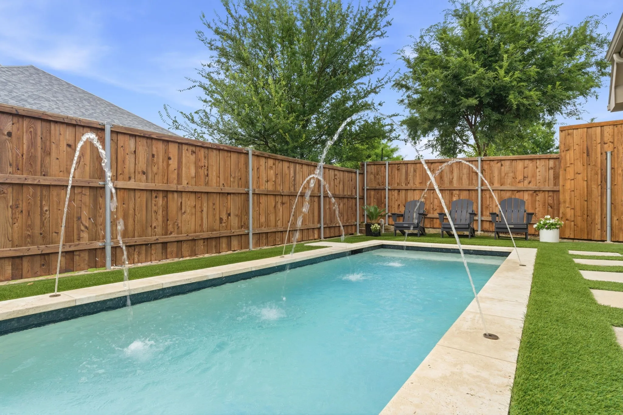 Four deck jets provide ambiance producing graceful arcs of water! Cool Turf expands throughout the backyard. Kid & pet friendly.
