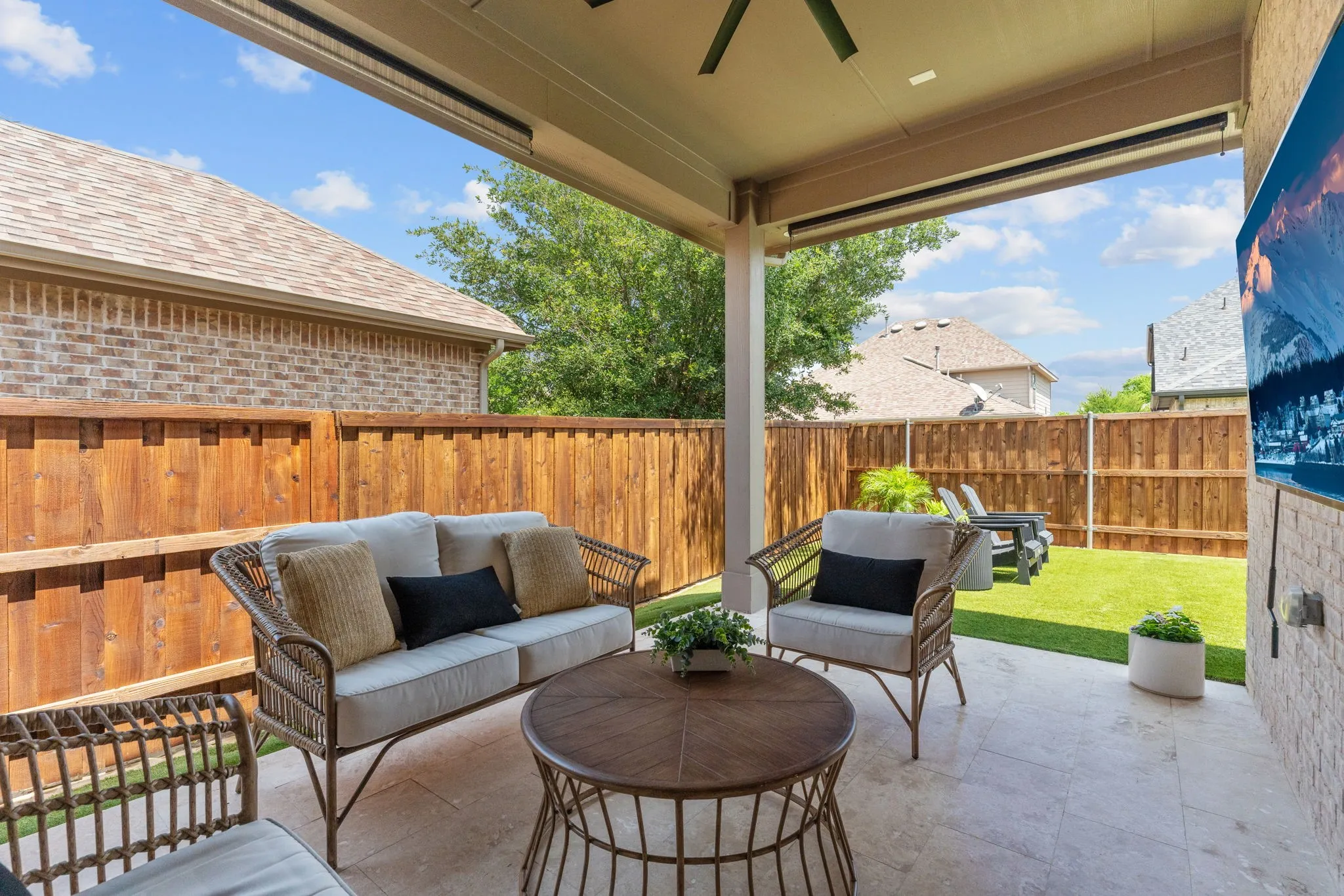 Whether your watching your favorite sporting event, cooking up a sumptuous barbecue meal or enjoying morning coffee....this covered patio offers the perfect spot to enjoy it all.
