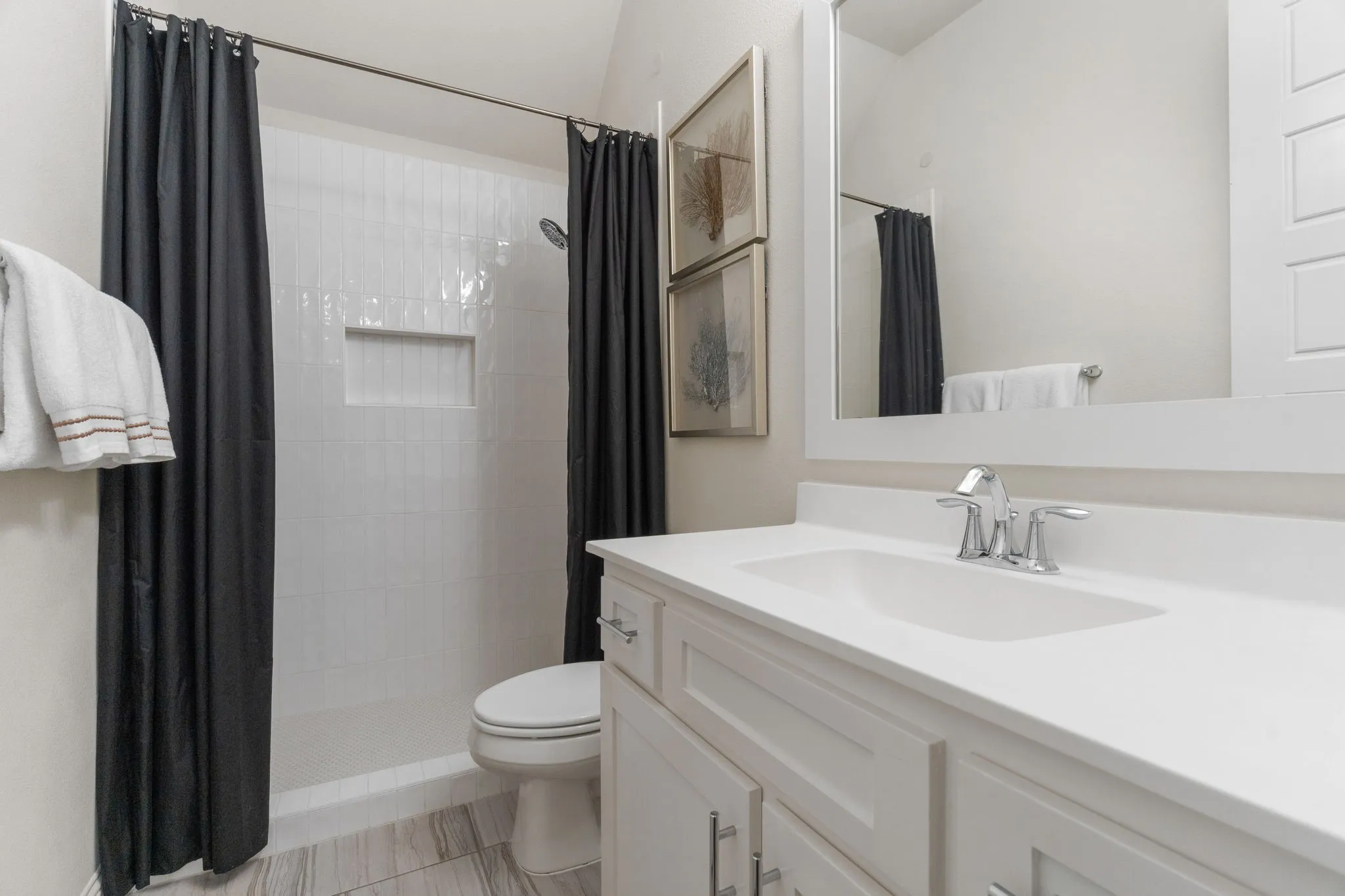 The sellers replaced the shower/tub combo with this custom-designed step in shower....optimal for easy step in access.
