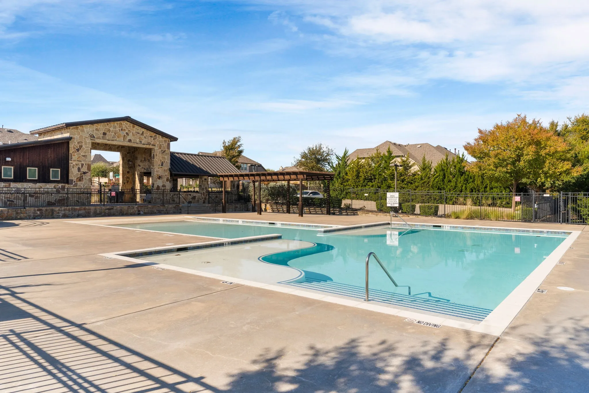 ...and a dual section swimming pool for Timber Creek residents & their guests. Pergola covered decking for those who appreciate shade cover. Surrounded by mature trees, it's a welcome retreat in a lovely setting.