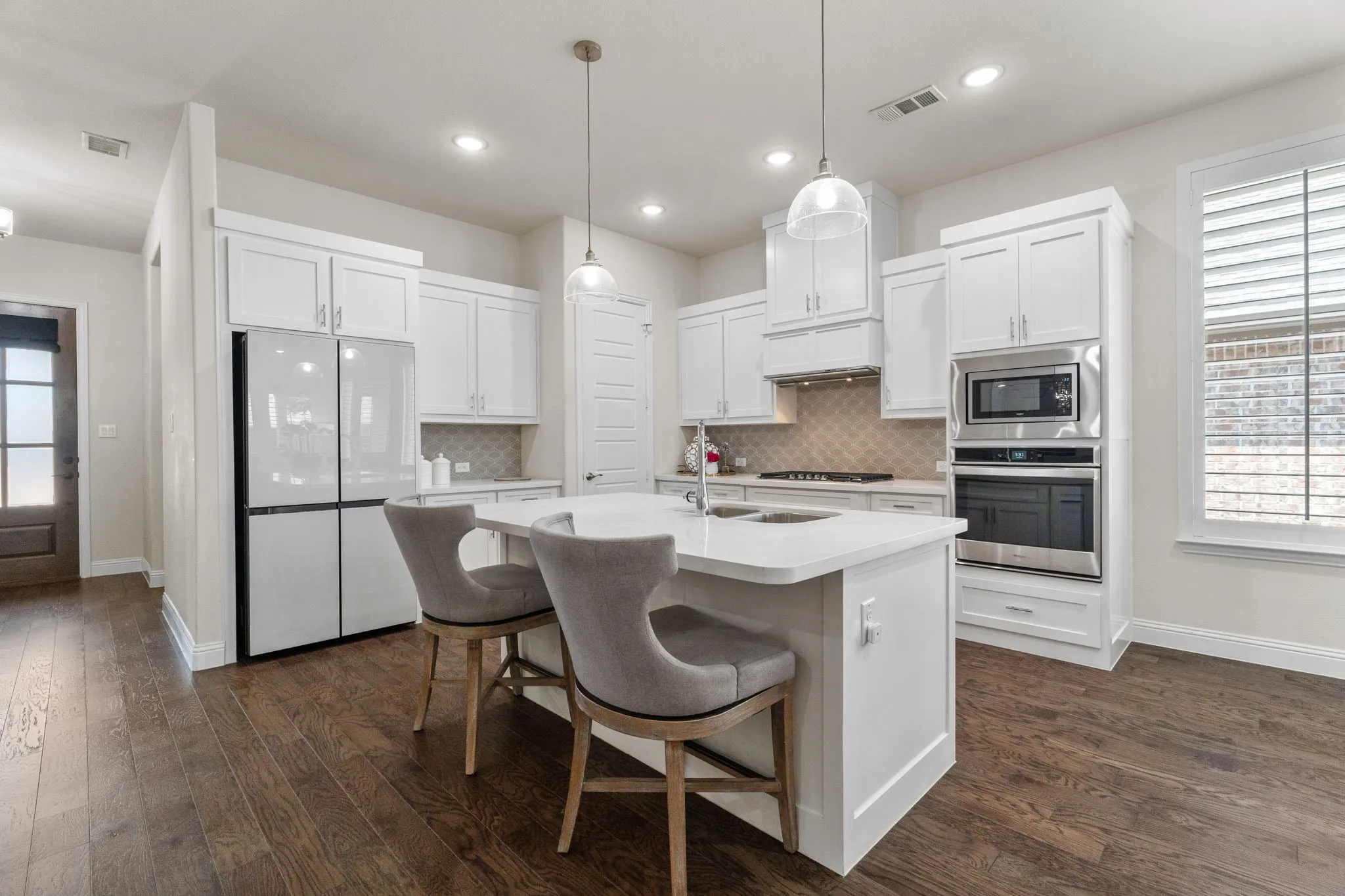 A great kitchen complex for the serious gourmet in the family! Quartz countertops & stainless appliances ~ just bring your own refrigerator!