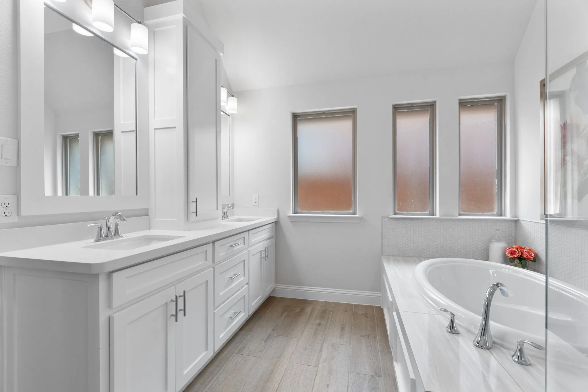 A bright & meticulously maintained primary bedroom that has functional space designed for everyday comfort.