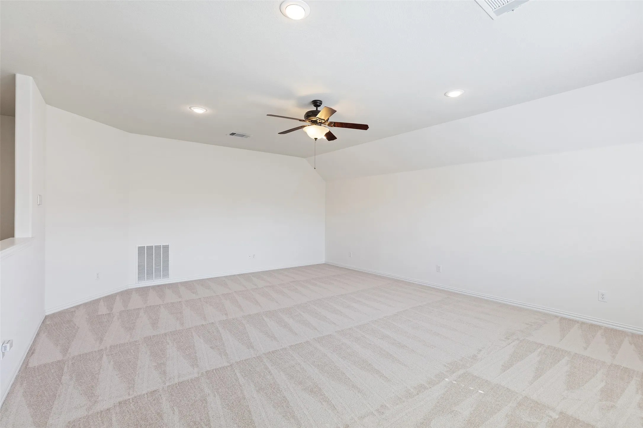 Expansive upstairs game room offering flexibility for media, fitness, or play.