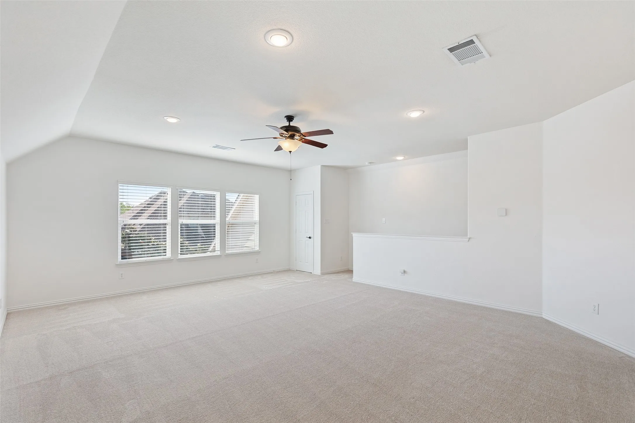 Expansive upstairs game room offering flexibility for media, fitness, or play.