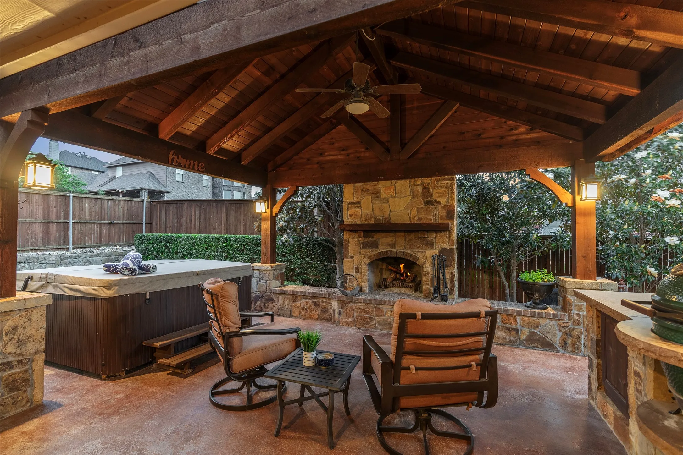 Resort-style backyard with custom putting green and lush surrounding landscape.
