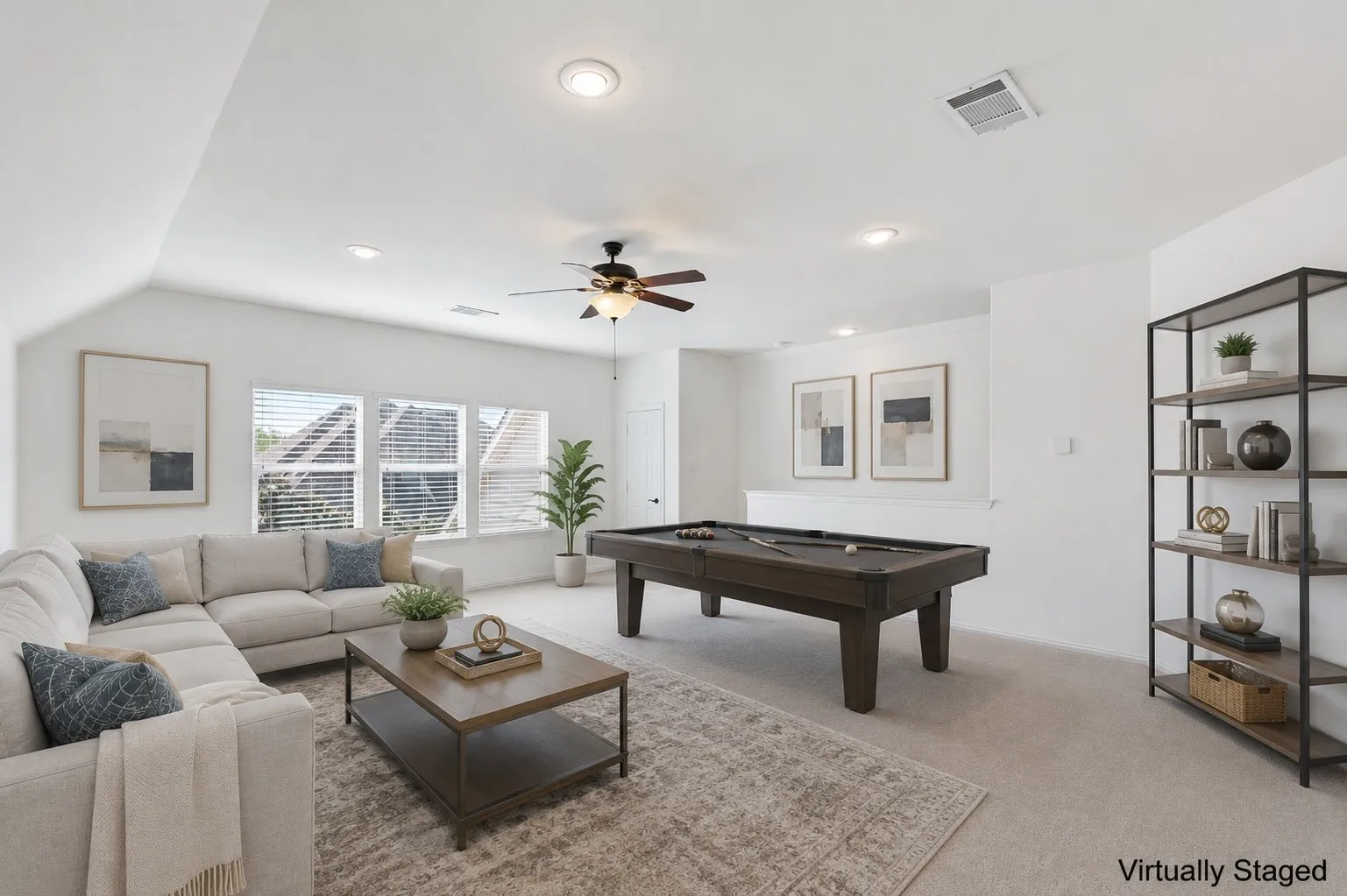 Expansive upstairs game room offering flexibility for media, fitness, or play.