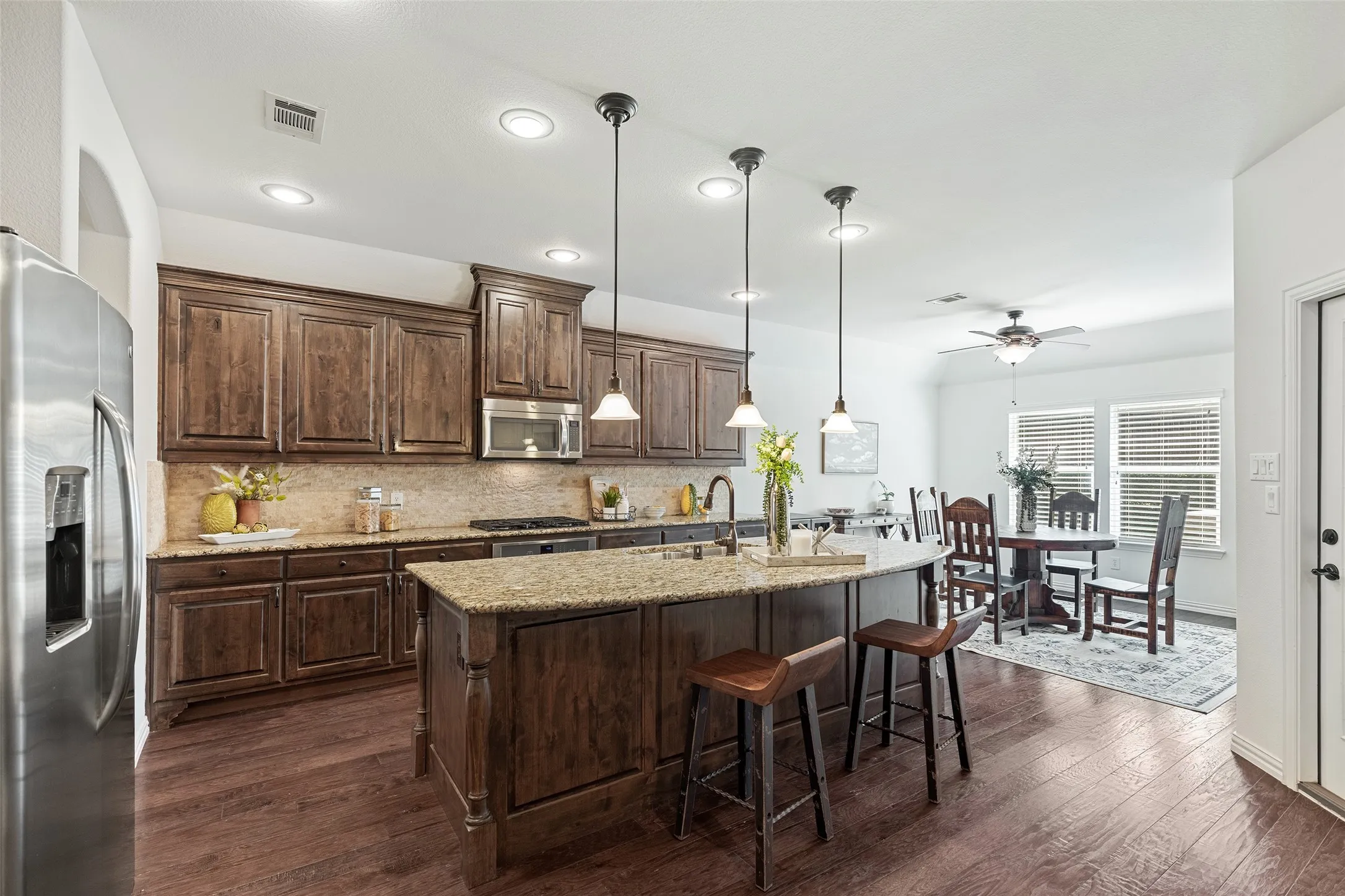 Oversized island kitchen designed for entertaining and everyday connection.