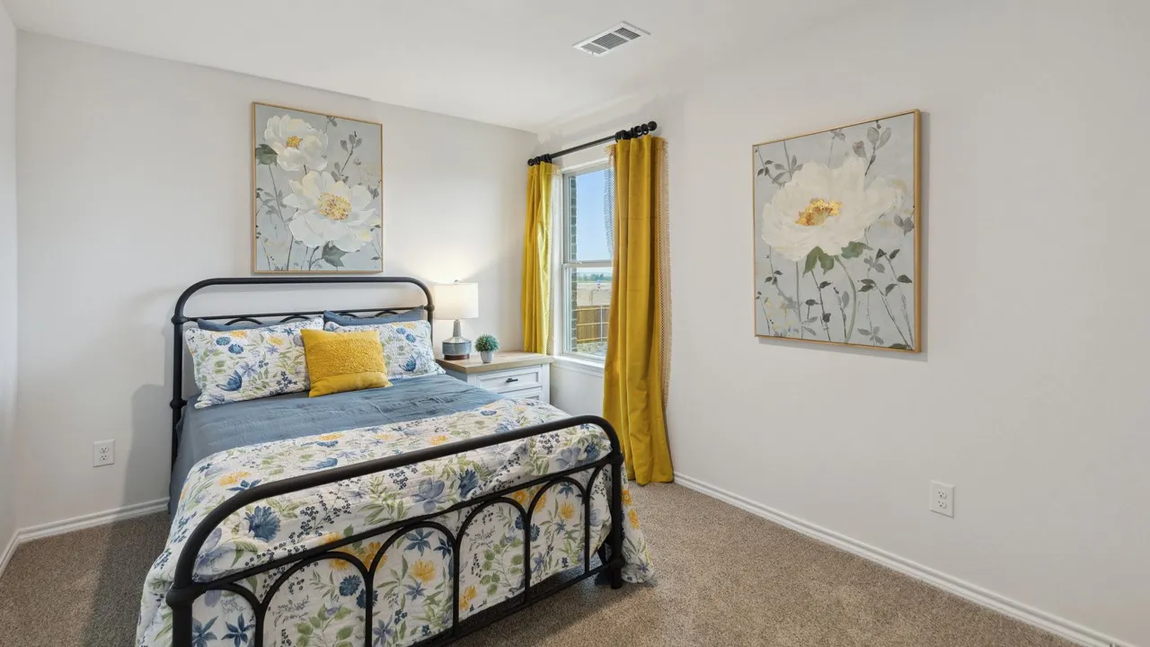 Carpeted room featuring a single window with curtain rod, white walls, and white trim
