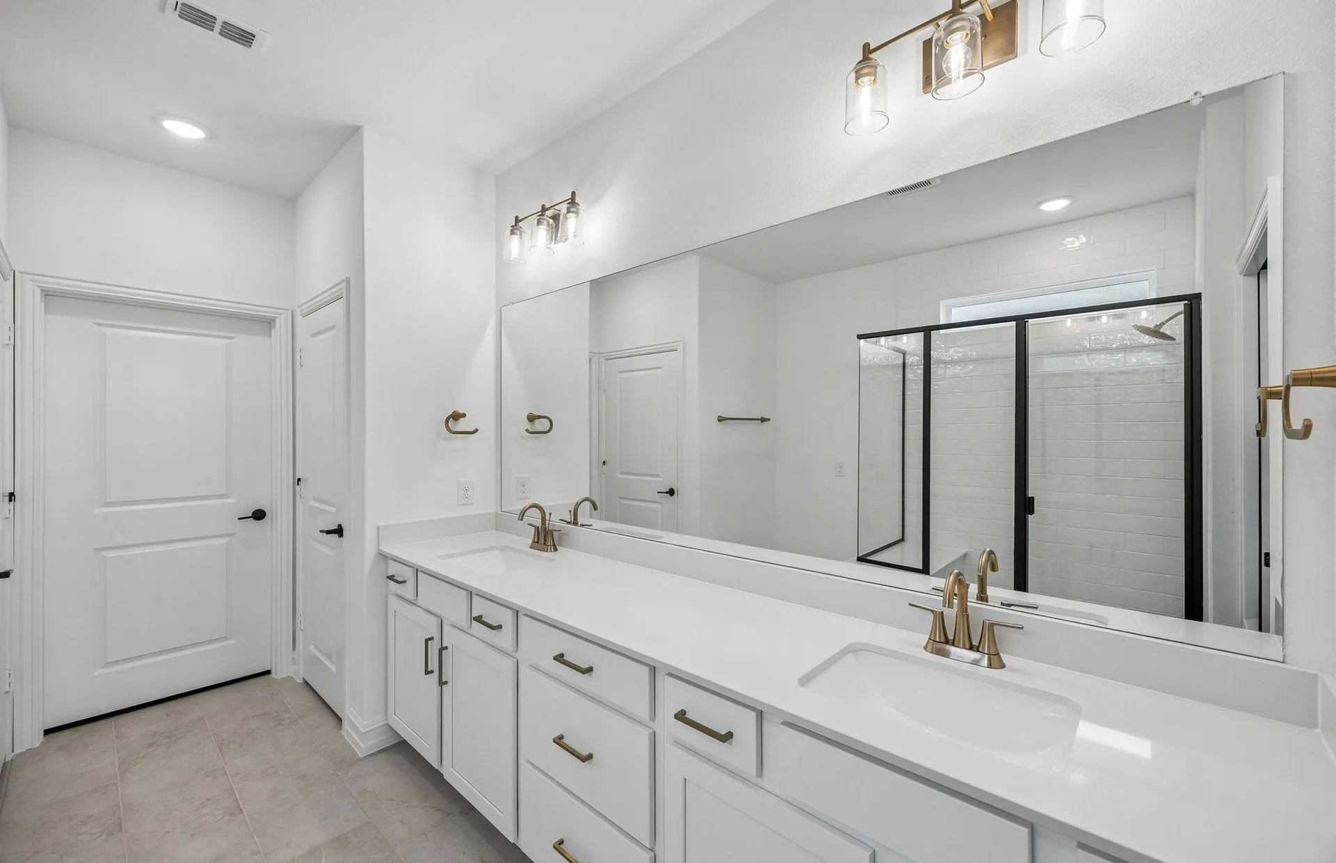 Primary bed with double vanity