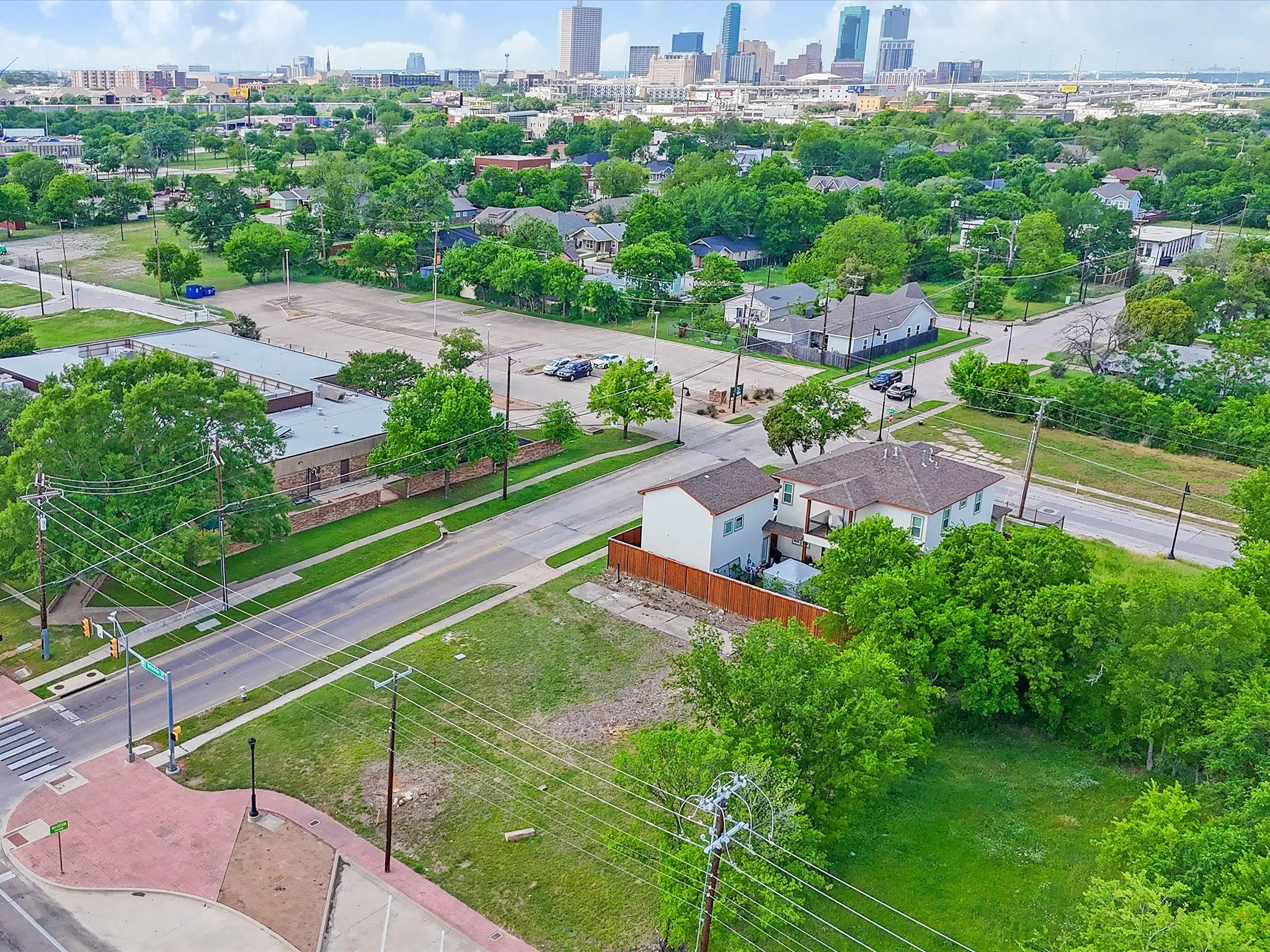 Aerial perspective of an urban setting with a distant city skyline