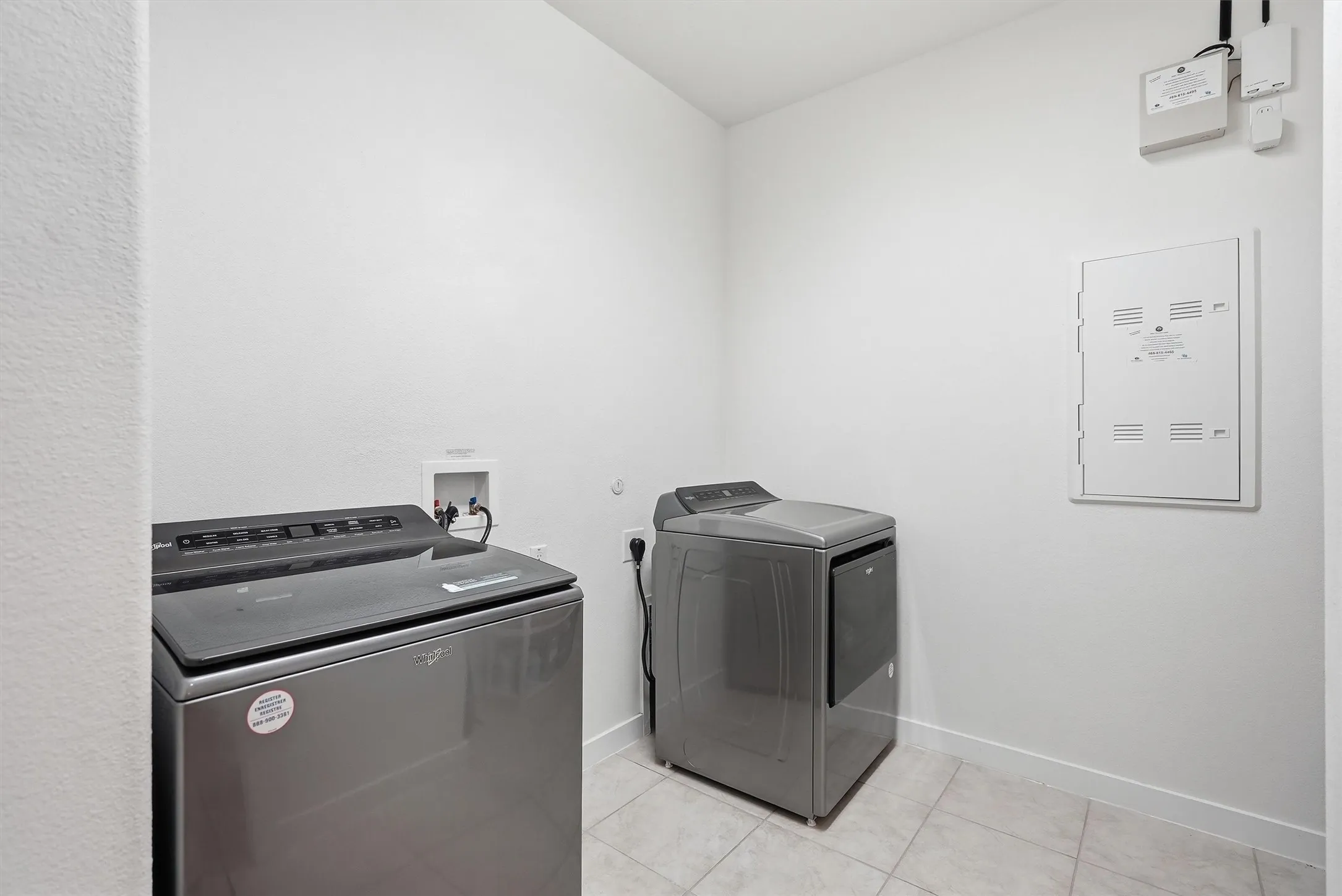 spacious laundry room. Shelving not pictured