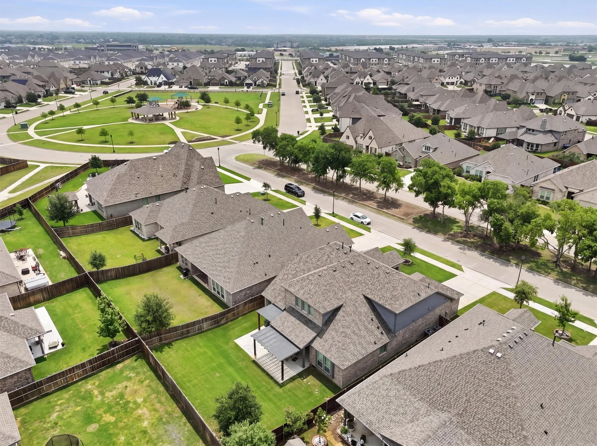 Back yard with extended Patio and Community Park shown