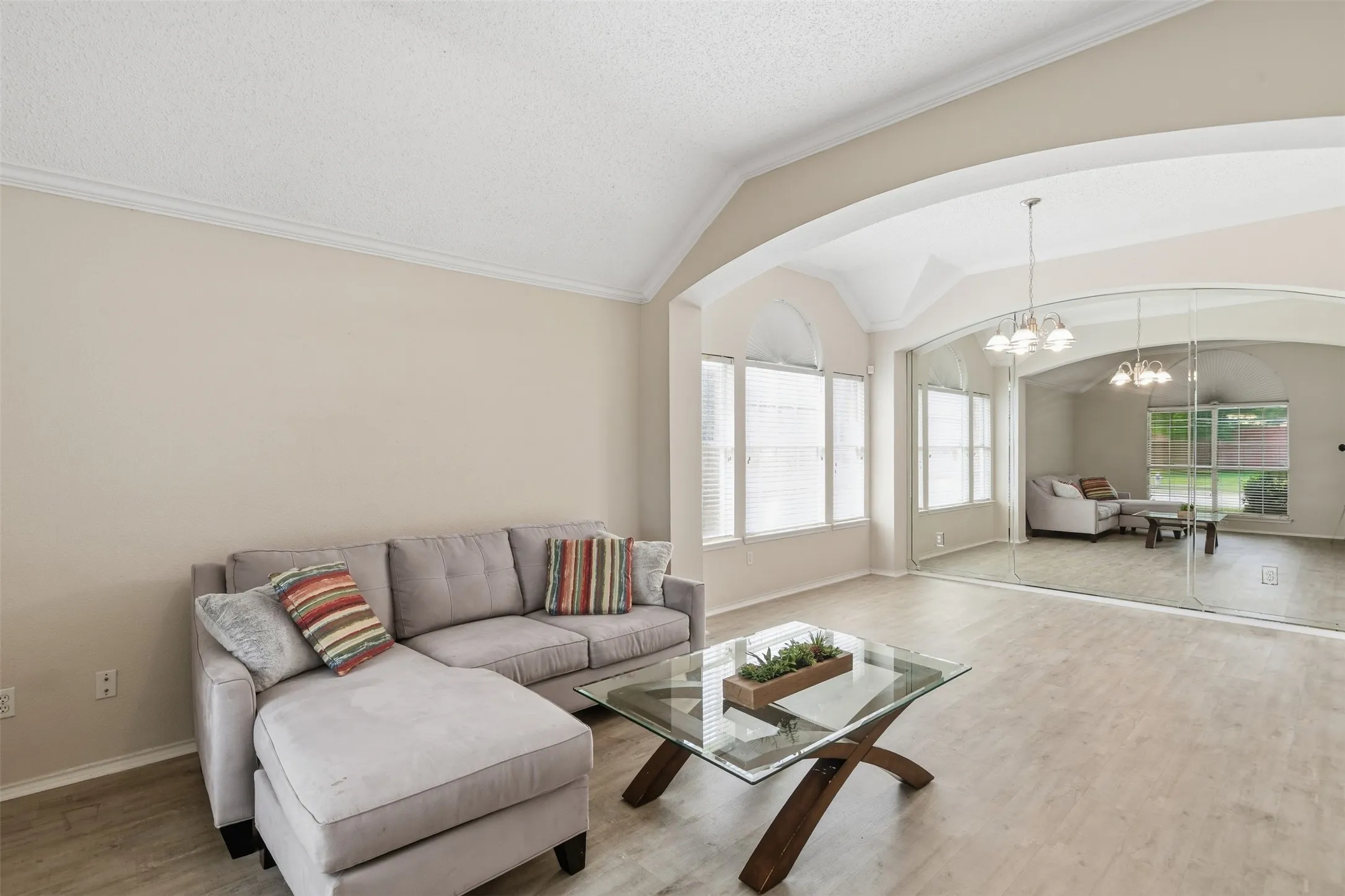 Spacious Living Space on your left as you enter with Dining Room in the background