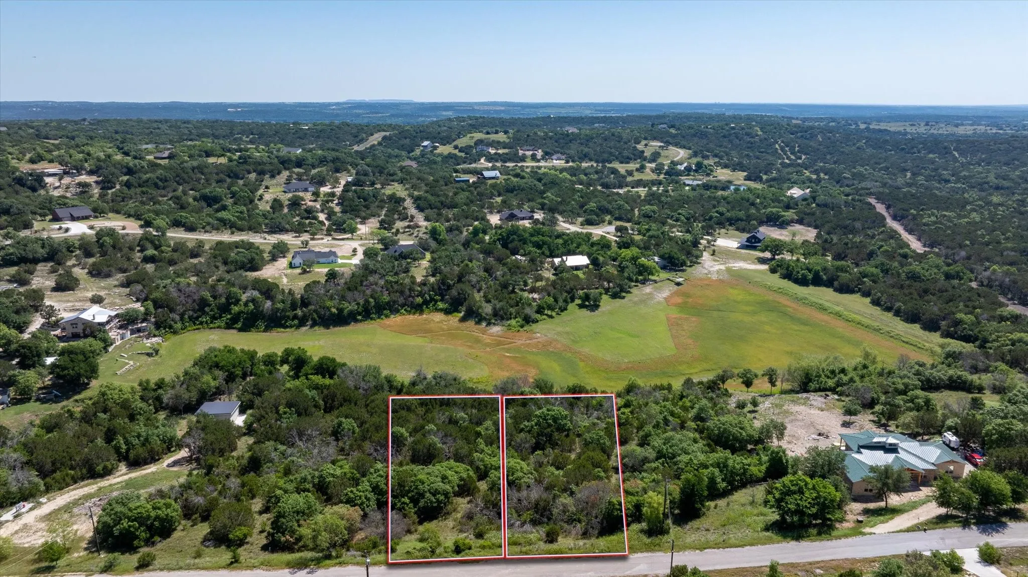 1065 Bluegill Ridge is the lot on the right