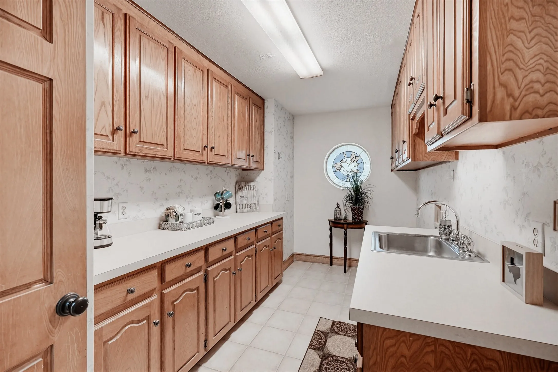 Laundry room with TONS of cabinets & storage.