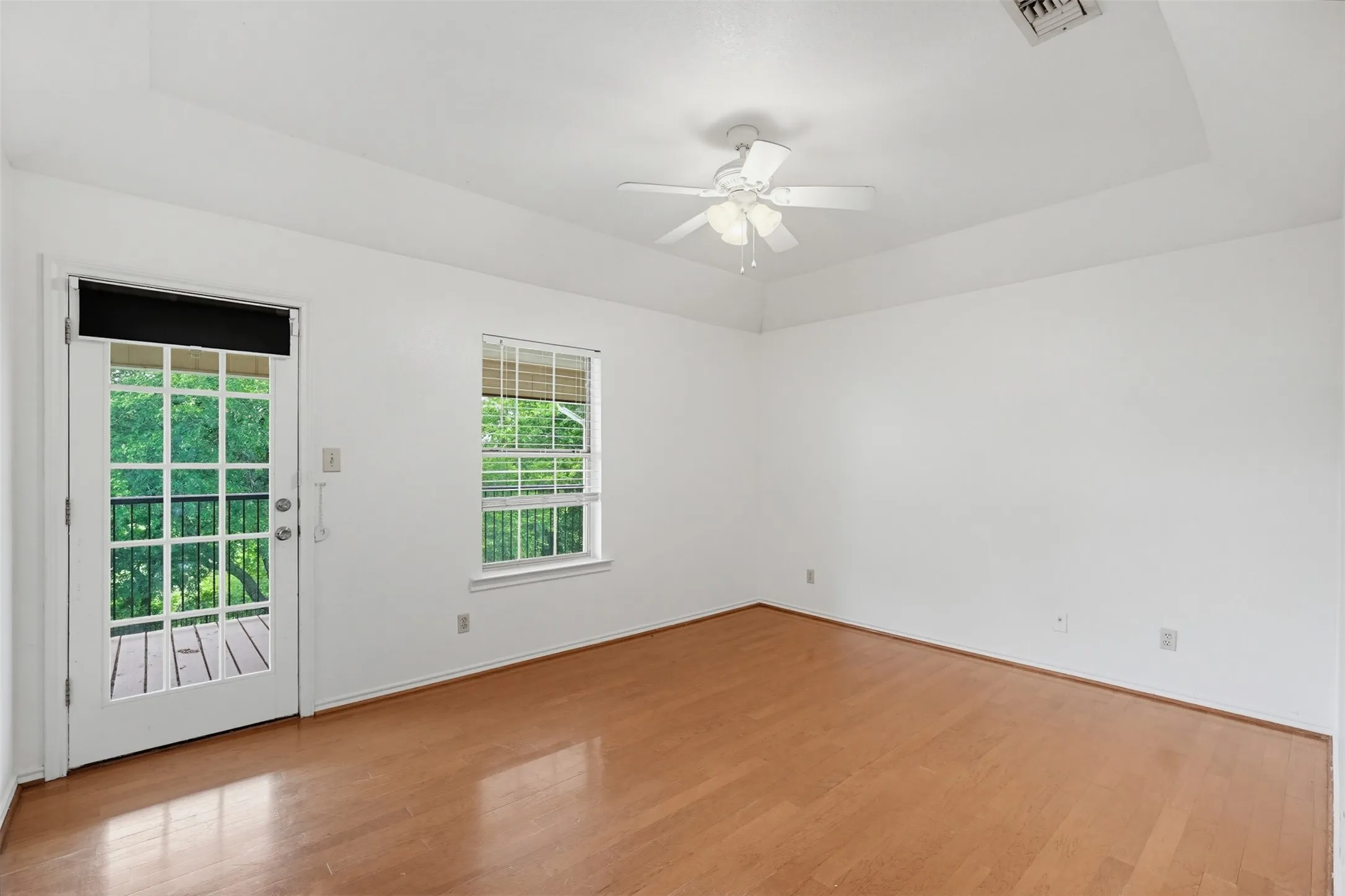 2nd office upstairs with a door to the balcony.