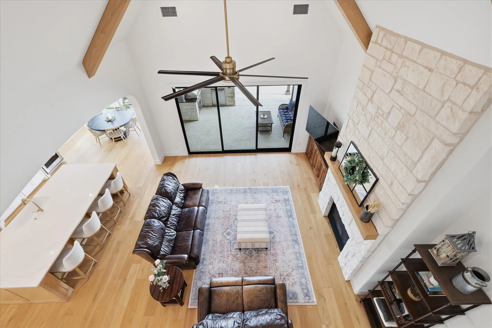 Great room with vaulted ceilings and exposed wood beams
