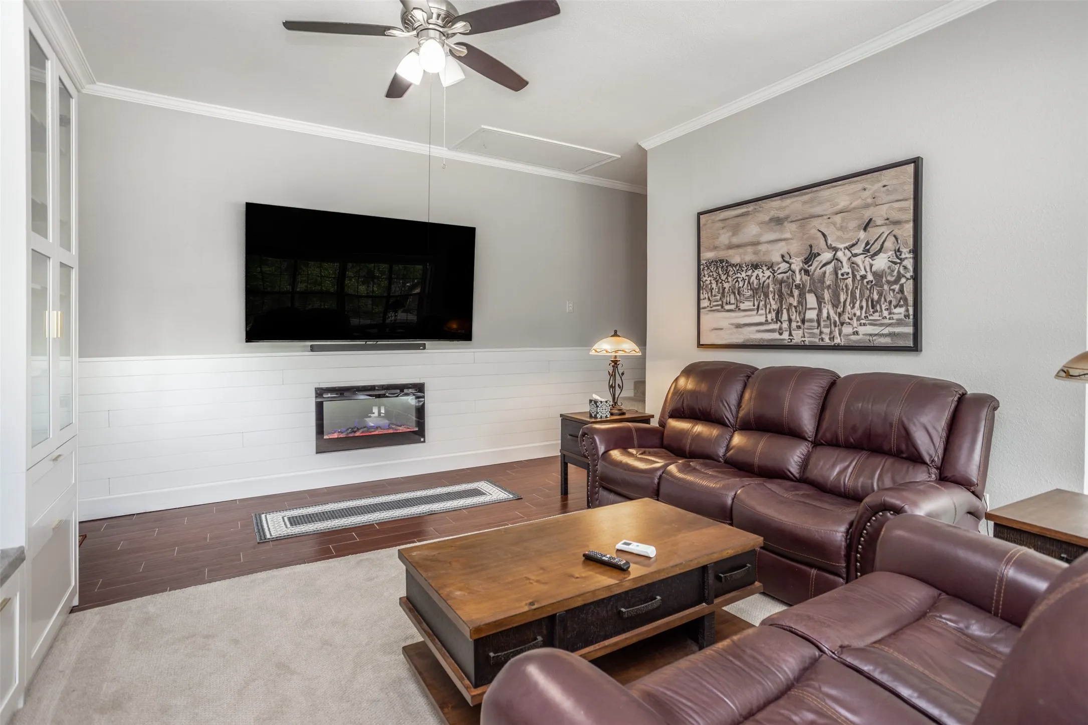 Cozy fireplace anchors the room with warmth & beauty