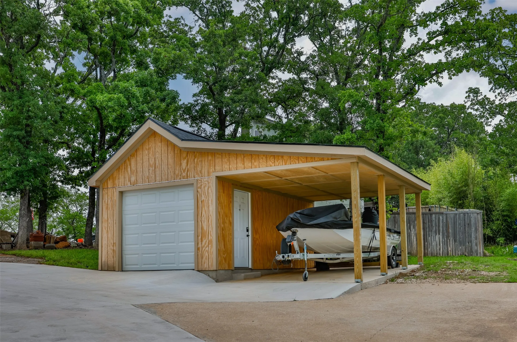 Separate garage/shop with a covered carport!