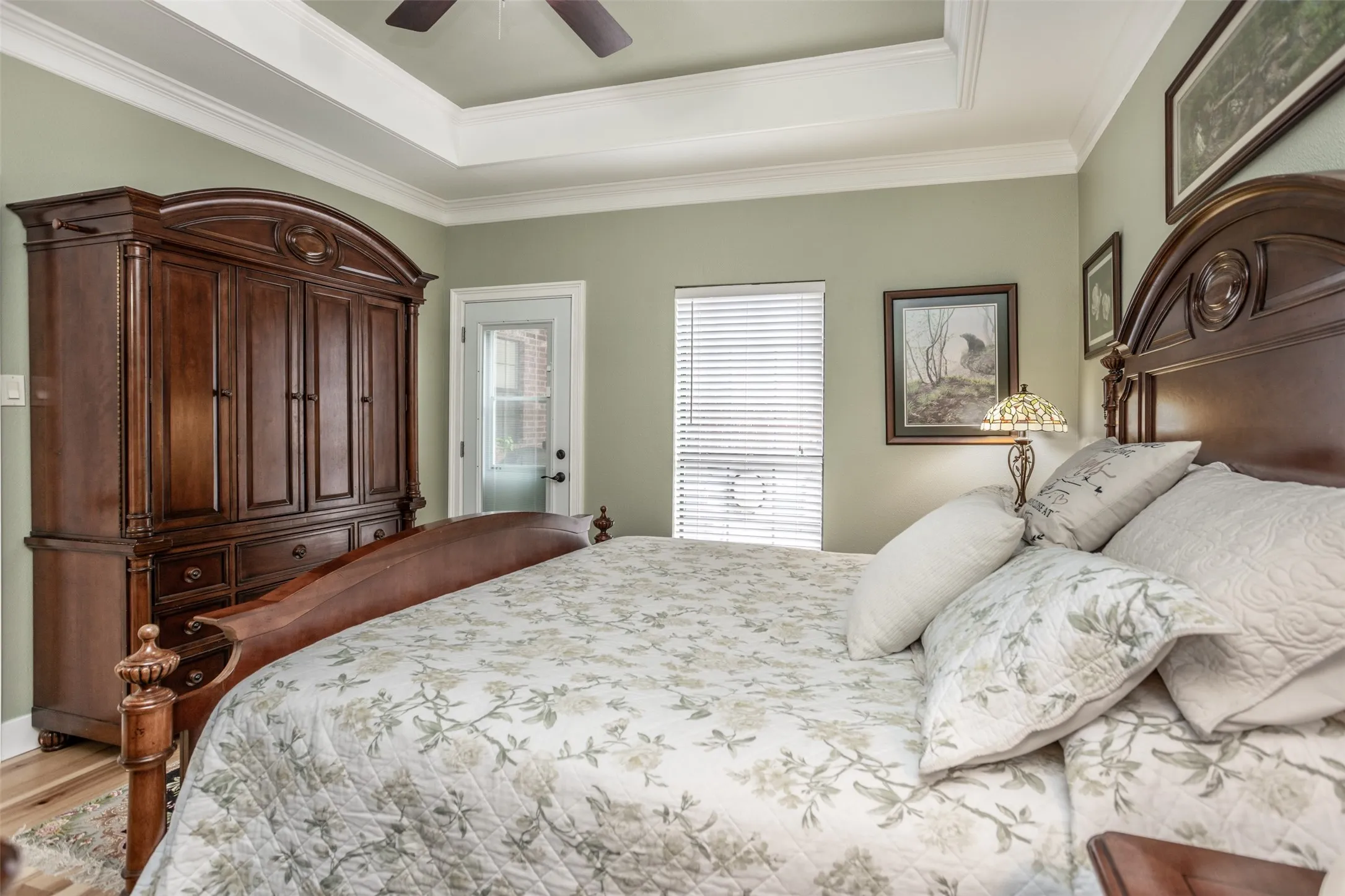 Primary bedroom- the closet features custom built-ins.