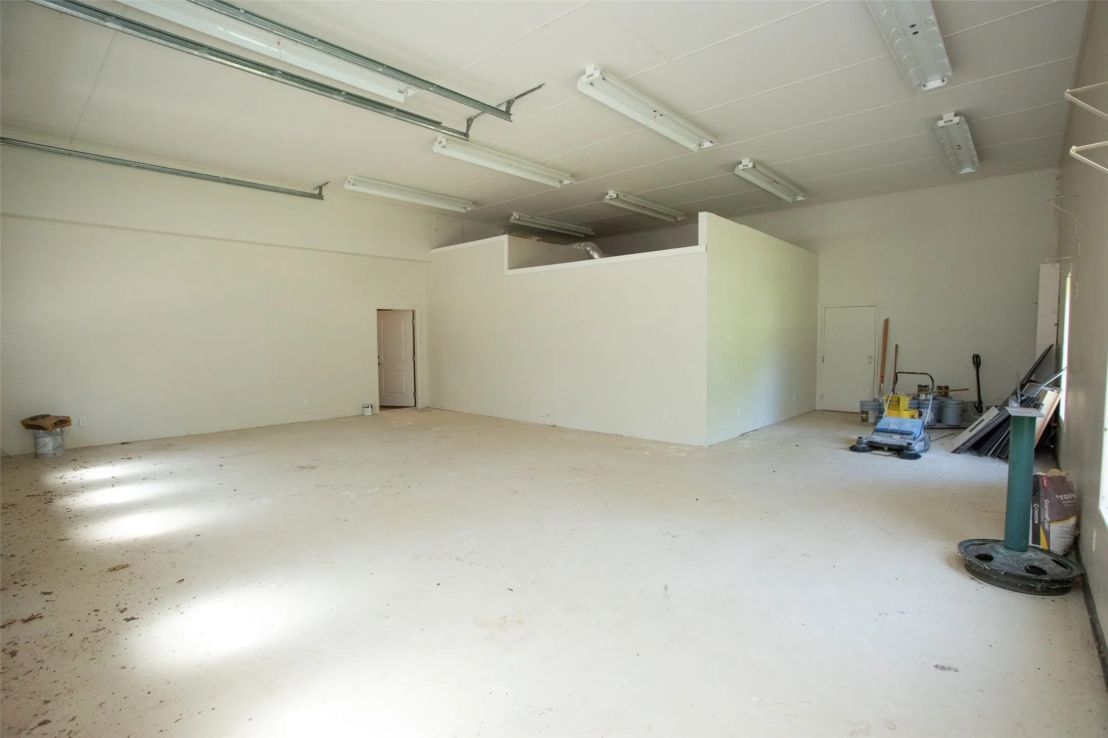 Additional storage is available above the primary closet area, maximizing space for seasonal items or long-term organization.