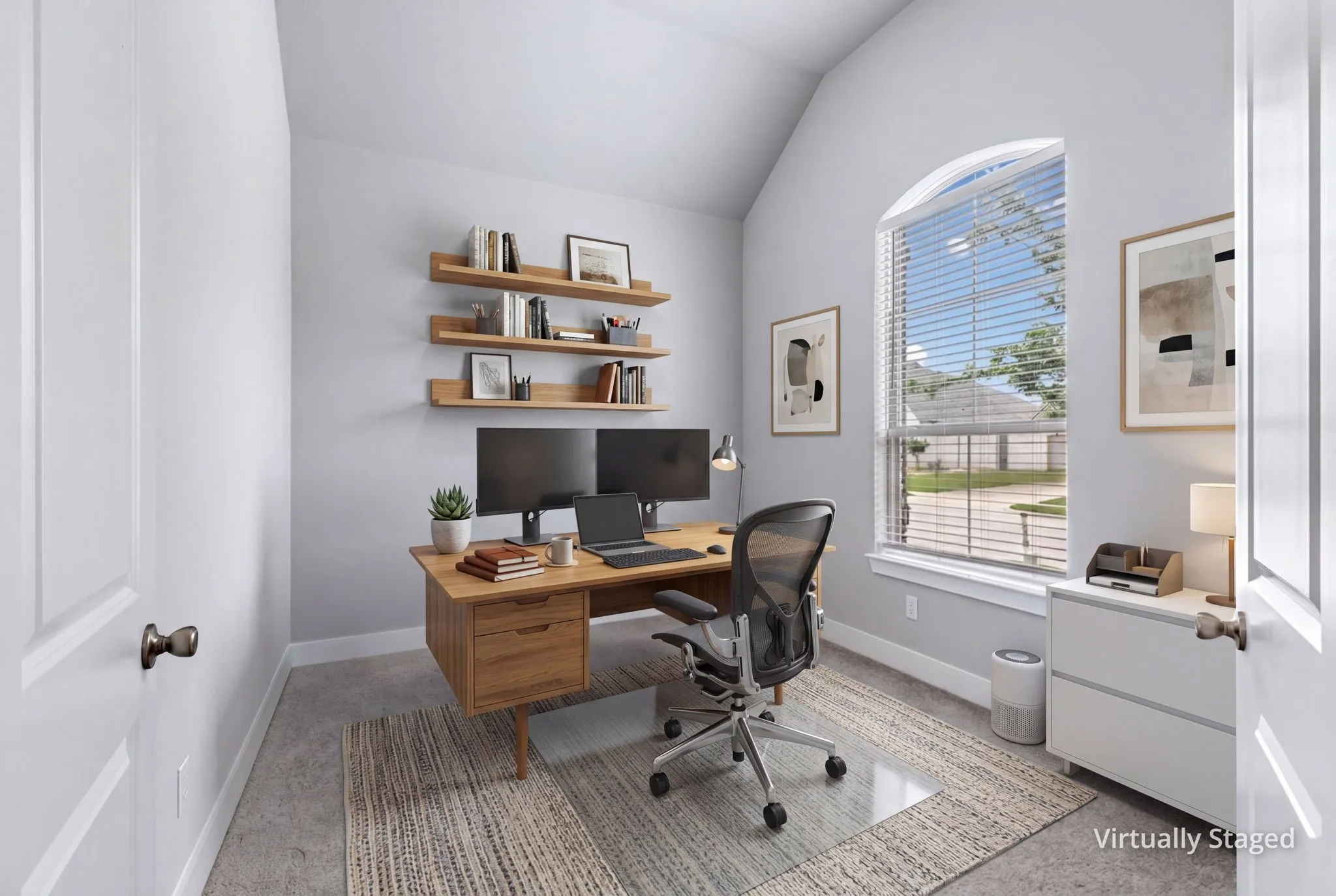 Vaulted ceiling with an arched window featuring blinds