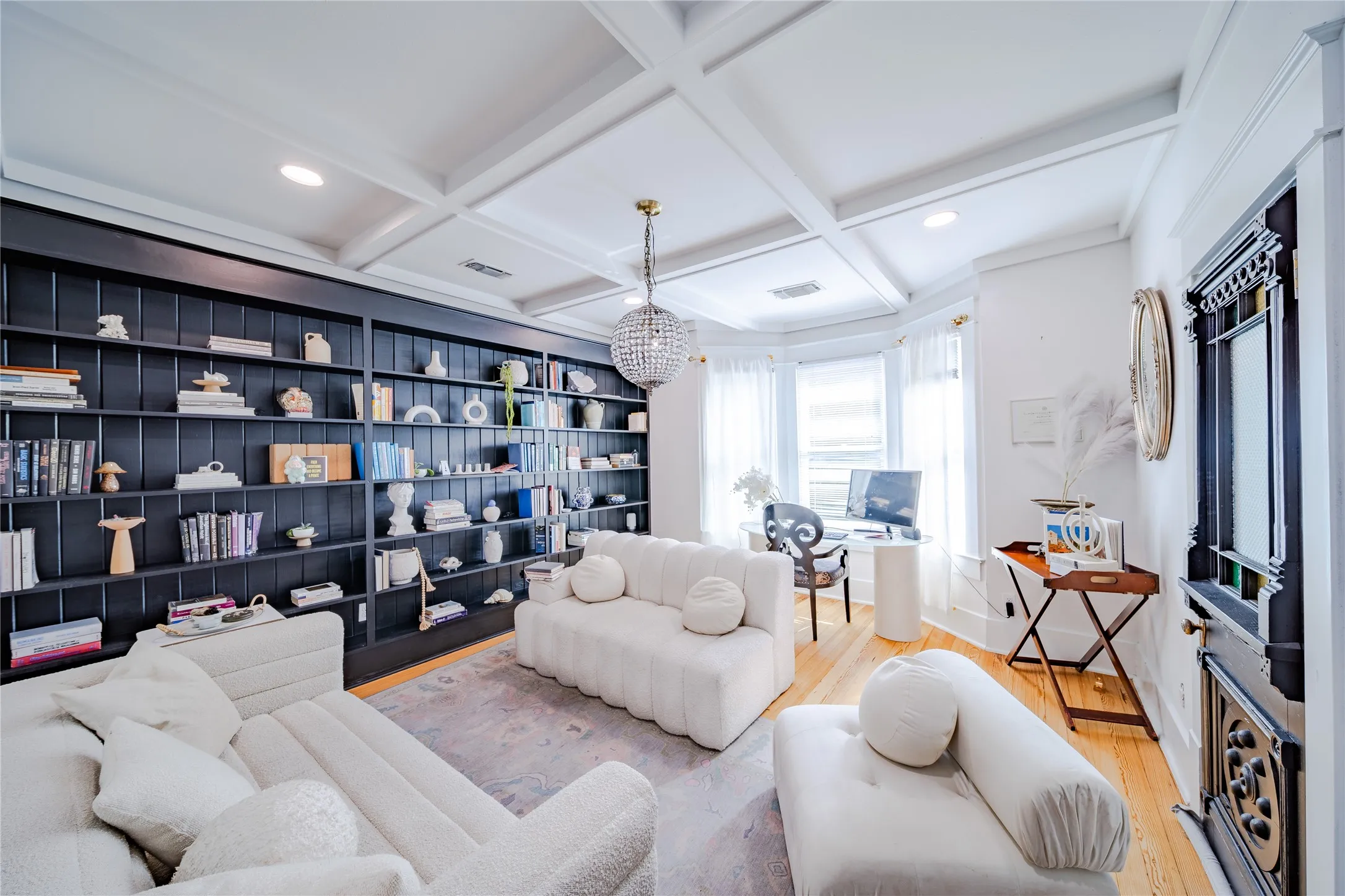 The first office on the second level features a bay window and looks out to the front yard.  This photo is taken from the entrance door from the hallway.