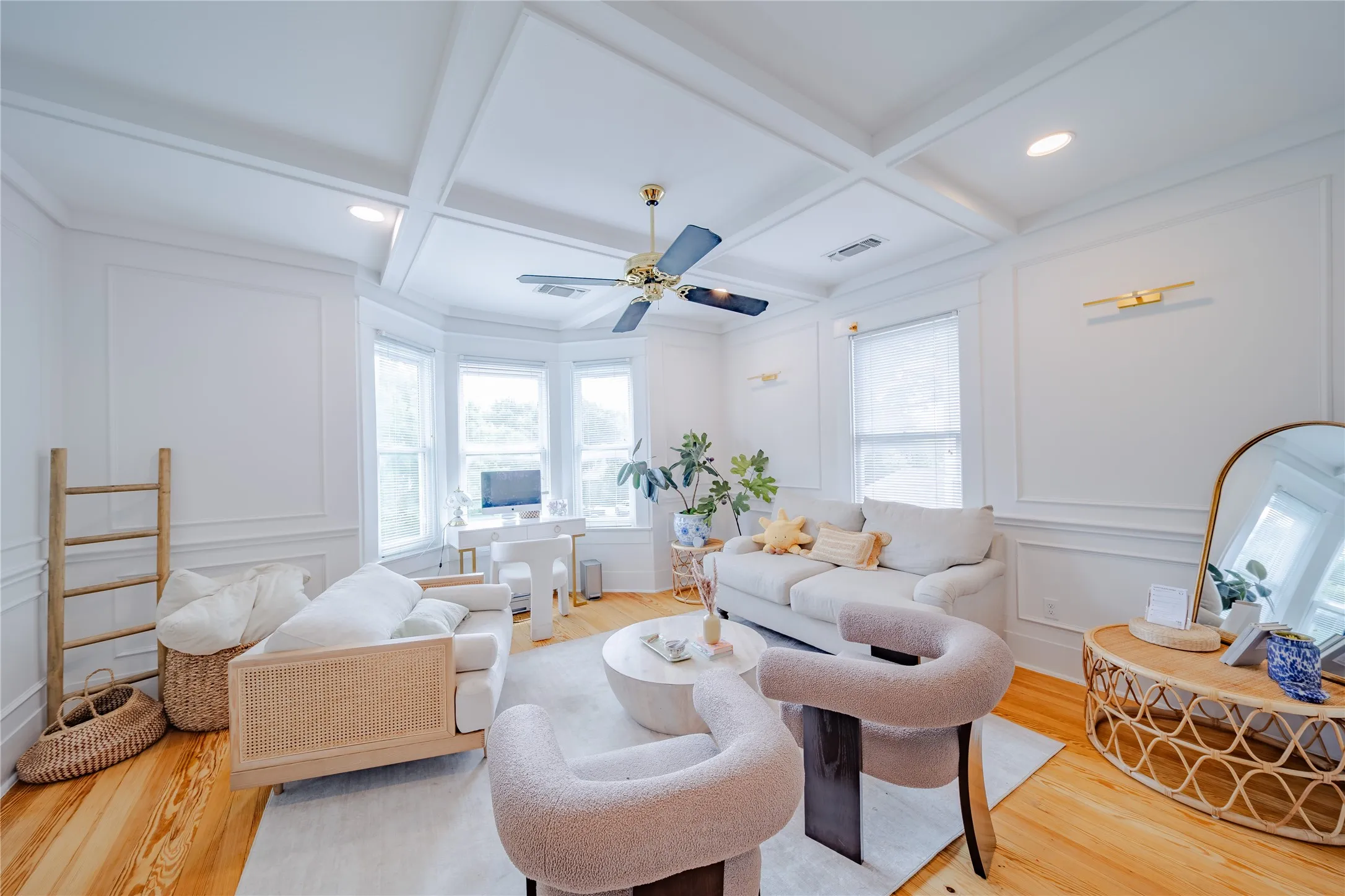 The second office on the second level also features a bay window with views to the front yard.