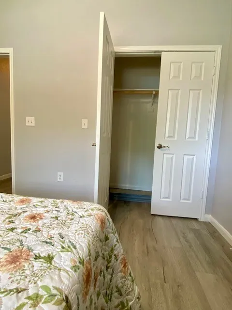 Closet in secondary bedroom
