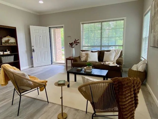View of living area looking toward front door