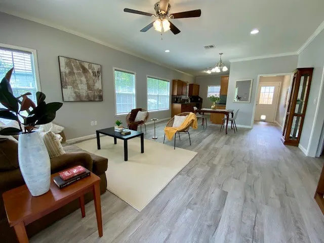 Open floor plan with view of backyard door