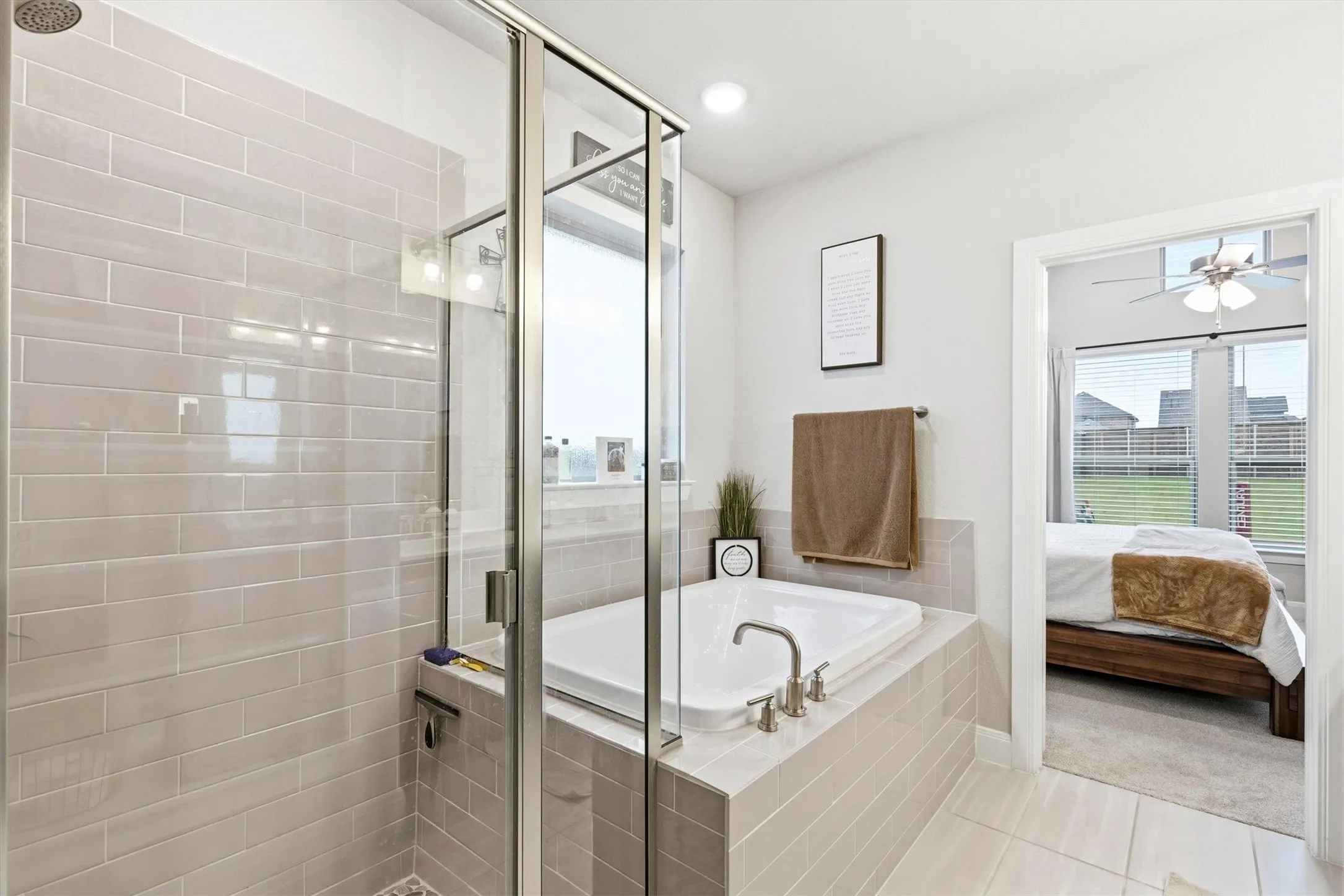 Primary bathroom with shower and a separate tub