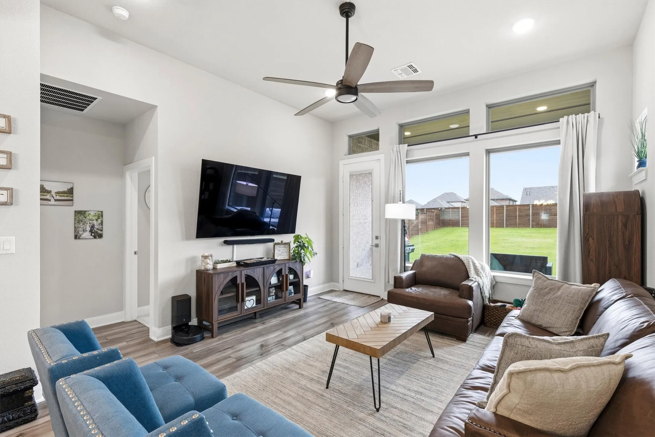 Living Room first floor with views to the back covered patio