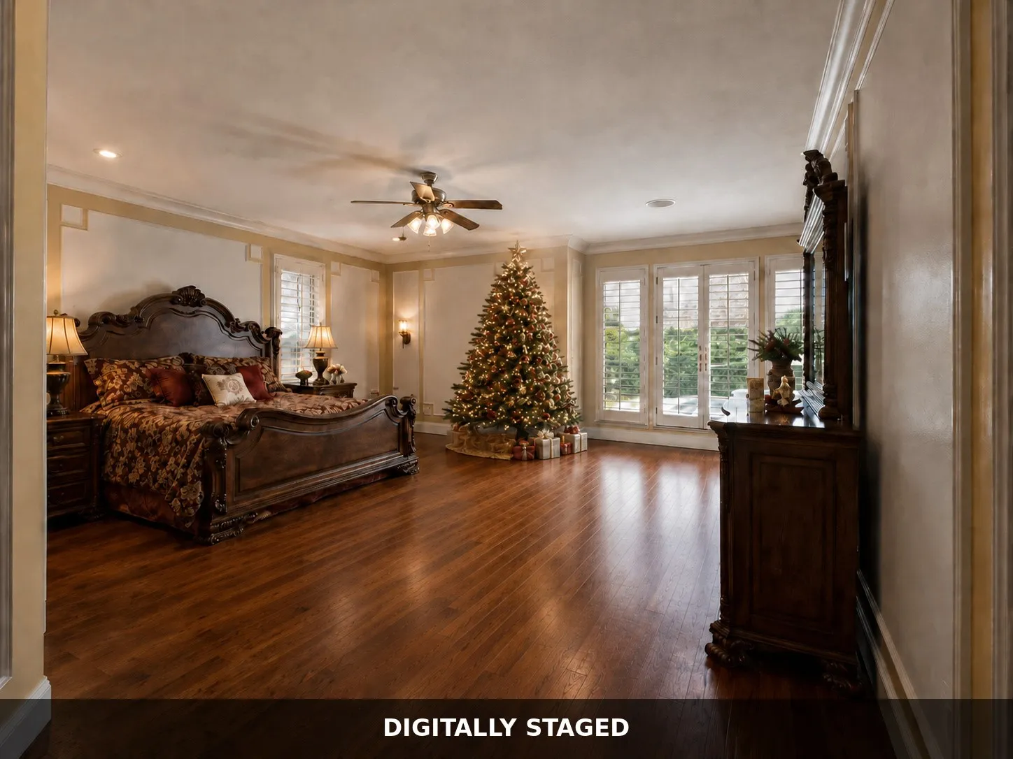 Wood-finish flooring with a ceiling fan, recessed lighting, and wall sconces