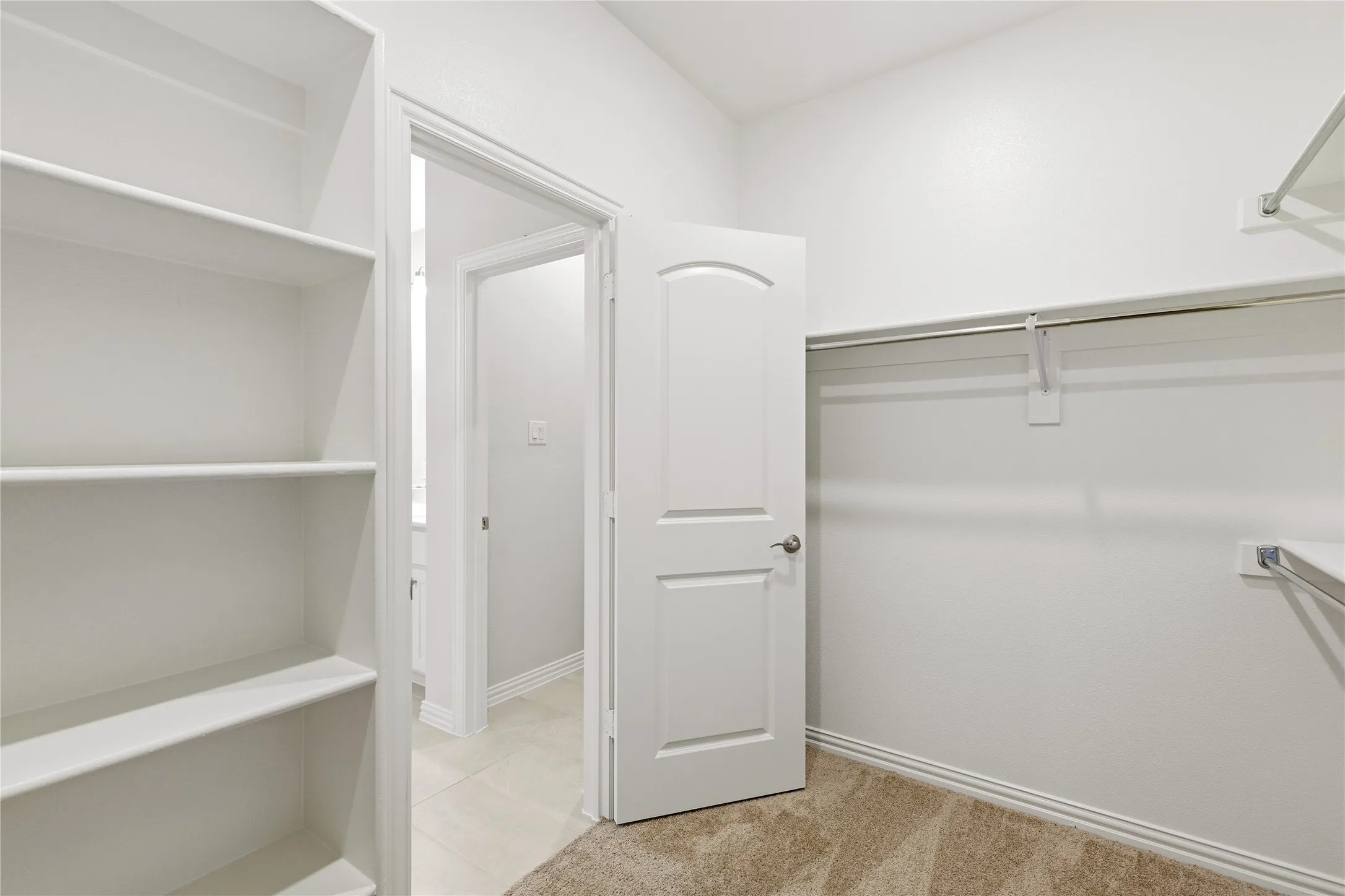 Primary bedroom closet.