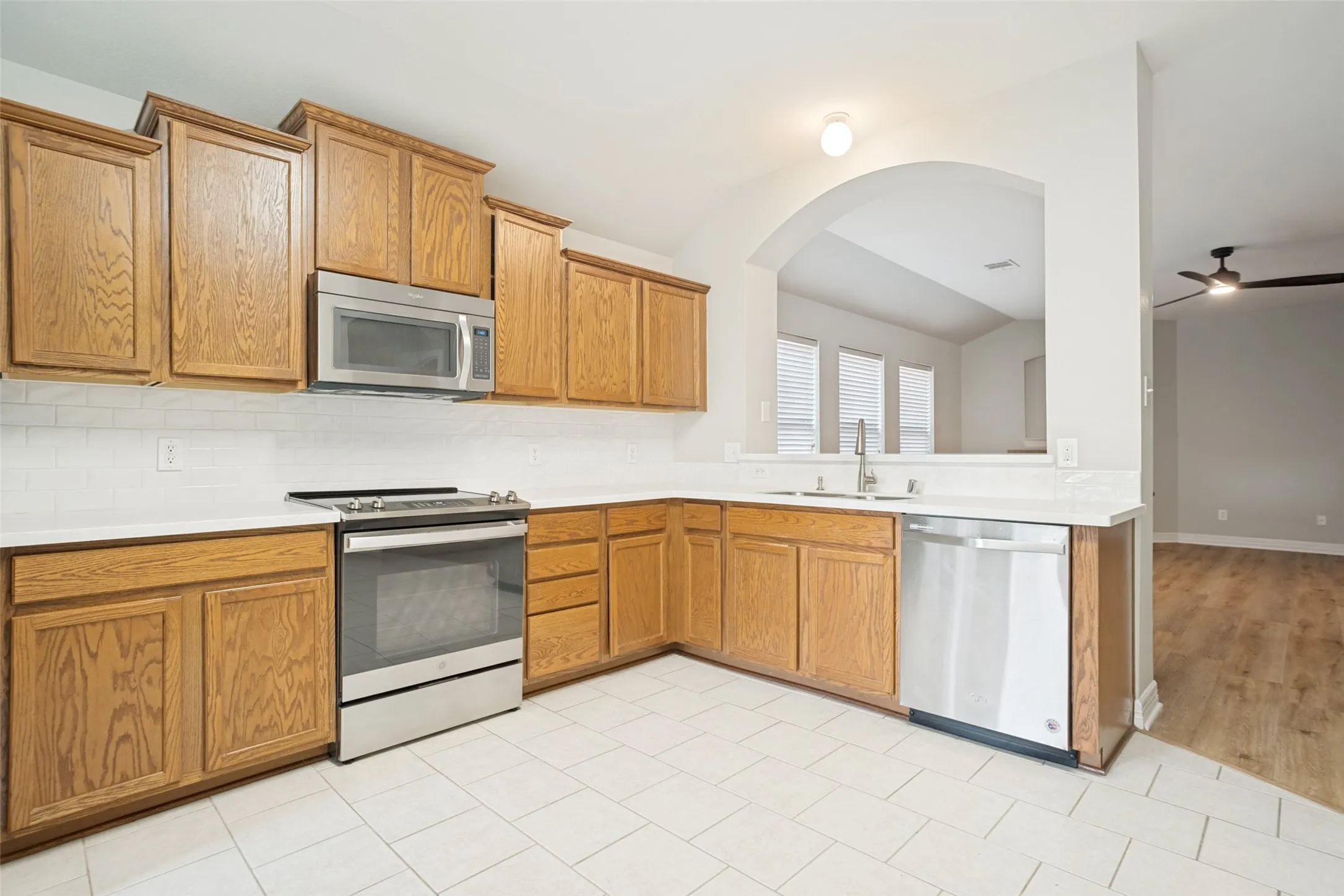 Stainless Appliances, on trend backsplash, updated countertops