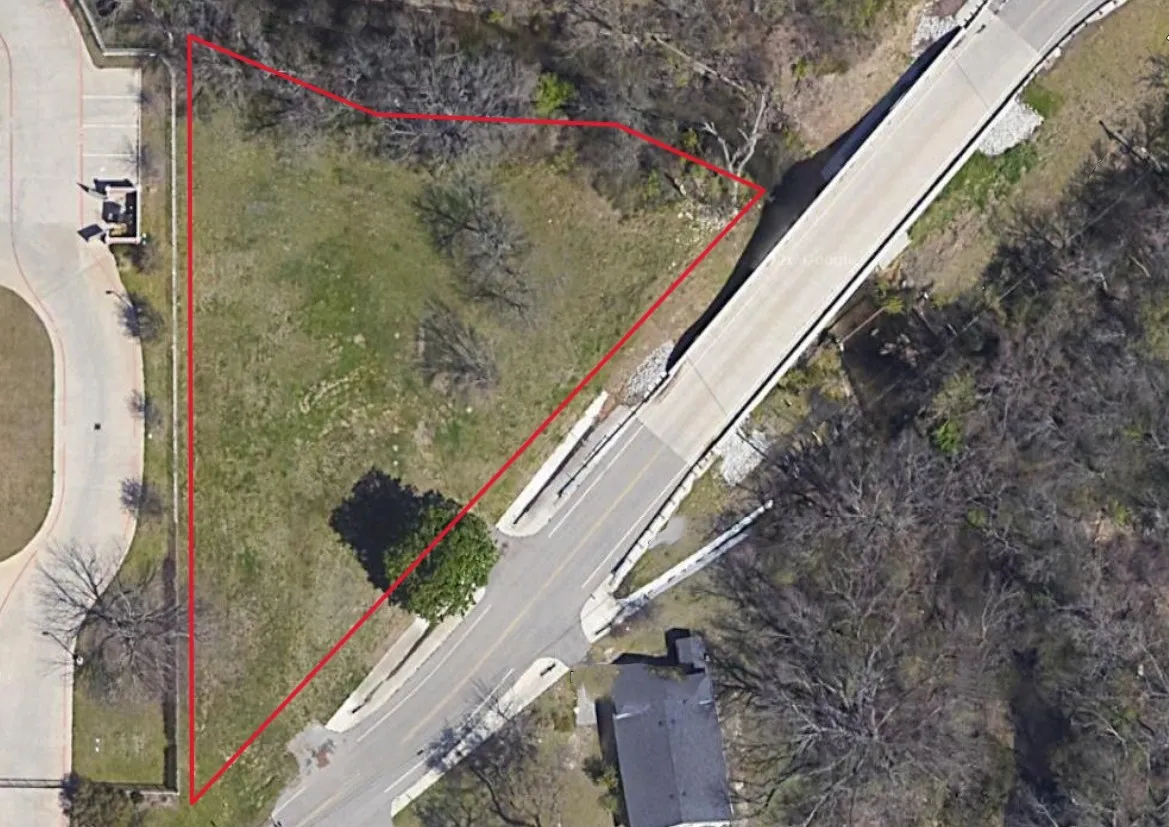 Aerial Survey. Illustrating the property's boundaries in relation to surrounding infrastructure