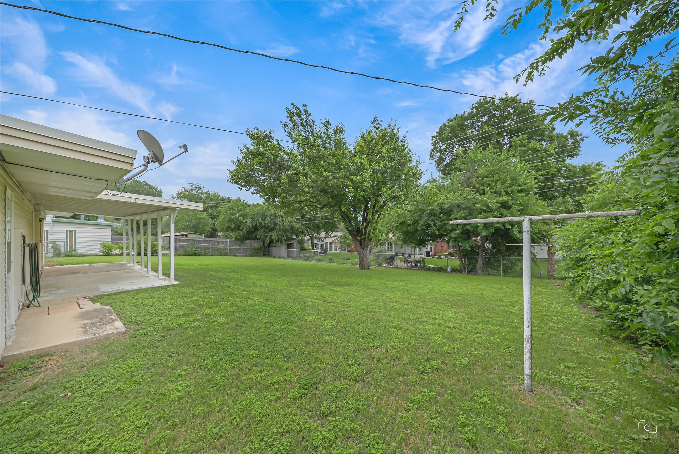 WOW! NEARLY a quarter of an Acre! Create your own backyard paradise this summer! Spacious covered back patio and ideal for entertaining ! Partial view of fenced  backyard which is pool sized, can plant your own vegrtable garden, room for a storage building , fruit trees, etc   No HOA!