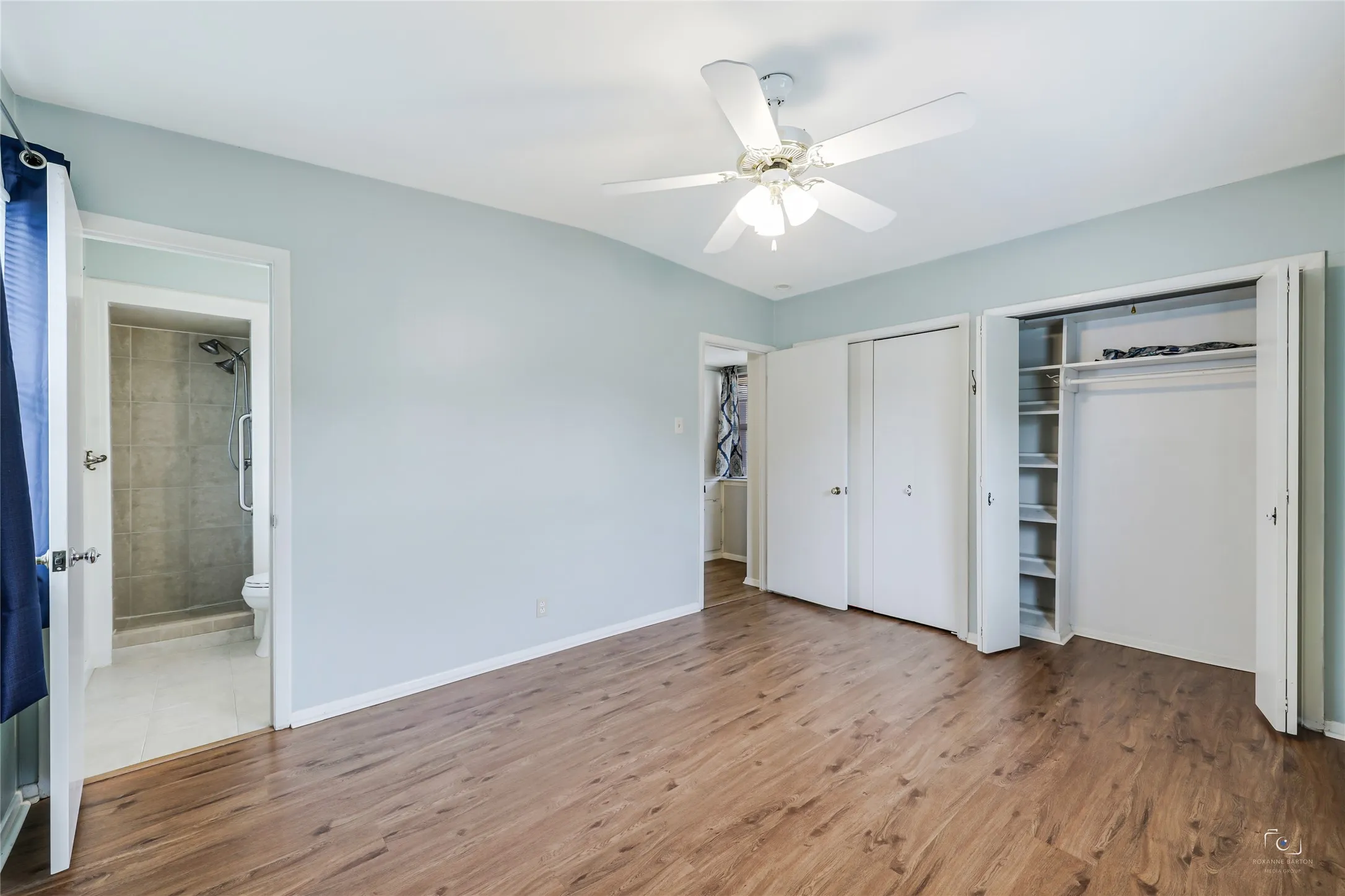 Views of the dual door access 11 ft closet for the prinary bedroom, lighted ceiling fan and private shower - bathroom!
