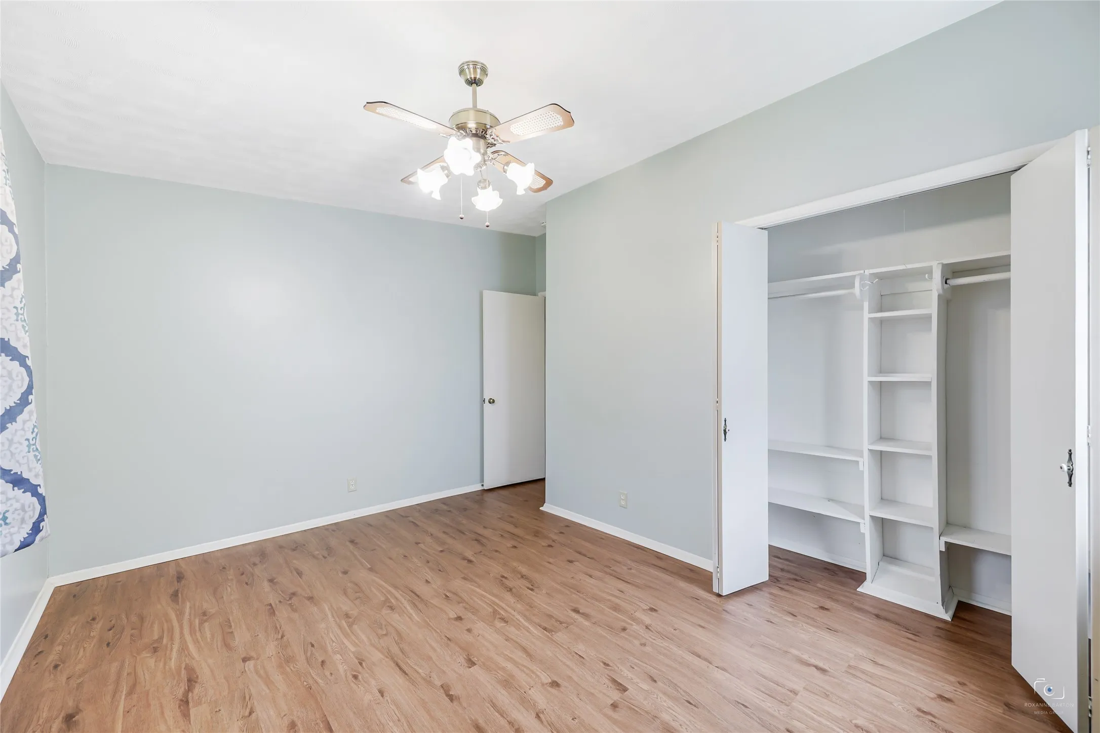 Fabulous built-in for this bedrook in the closet - ideal for extra organization - wall space for furniture - could be an office, craft or sewing room as well if an extra bedroom is not needed.  Dont's miss the virtual tour with printable flloorplan and I guide for views of this home as well!