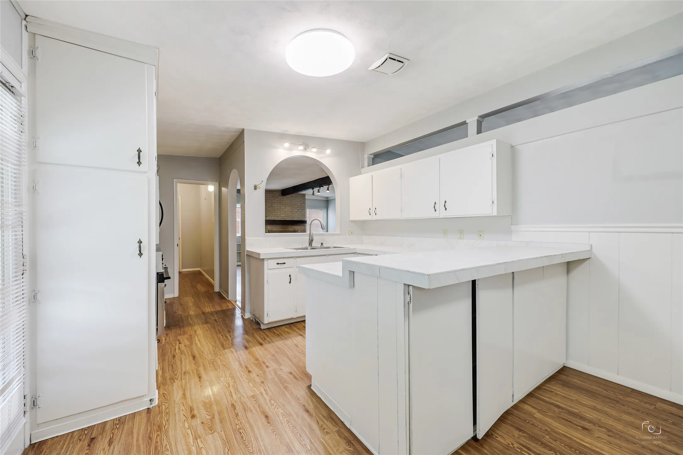 Breakfast Bar with additional underneath storage and another view of this really functional kitchen for those who like to cook, prepare meals, make lunches etc.....and room for the pots and pans, cookware, utensils, plates, etc