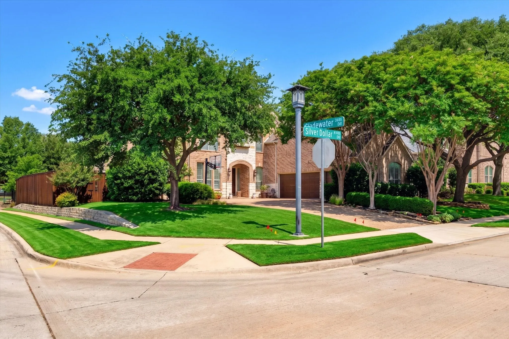 Positioned on a beautiful corner lot, this home enjoys mature landscaping, side-yard openness, and quick access to neighborhood trails.