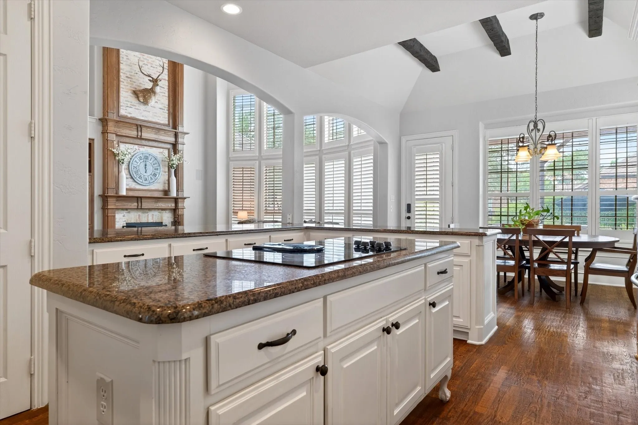The kitchen opens beautifully to the living and breakfast areas, keeping everyone connected without everyone being directly underfoot. Miracles happen.
