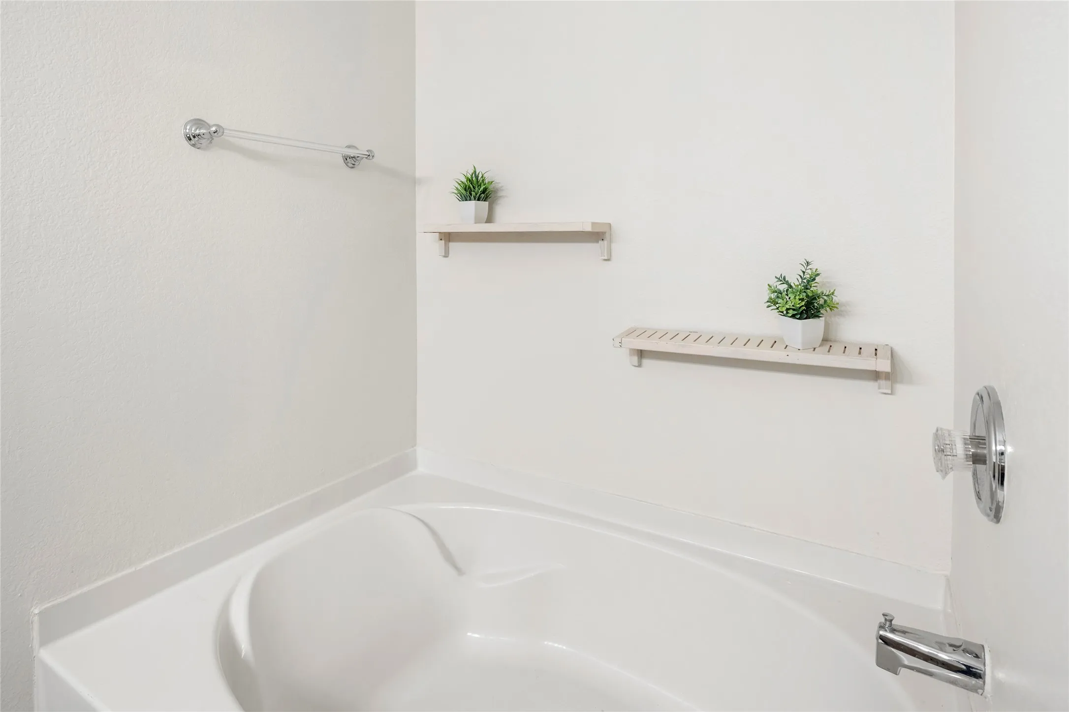 Large soaking tub in this primary bath....