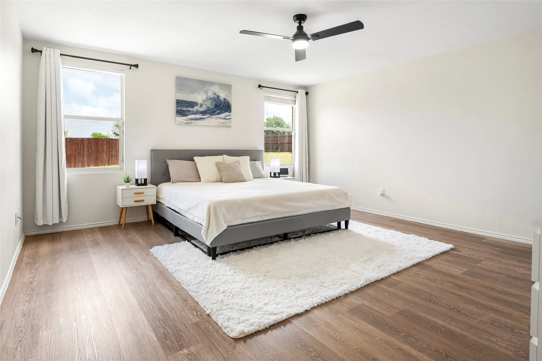 Huge primary bedroom that looks onto the back yard....