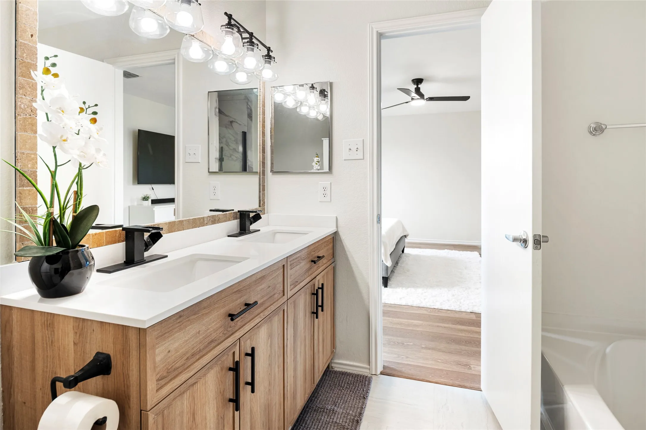 Lots of beautiful lighting and matching faucets and pulls....