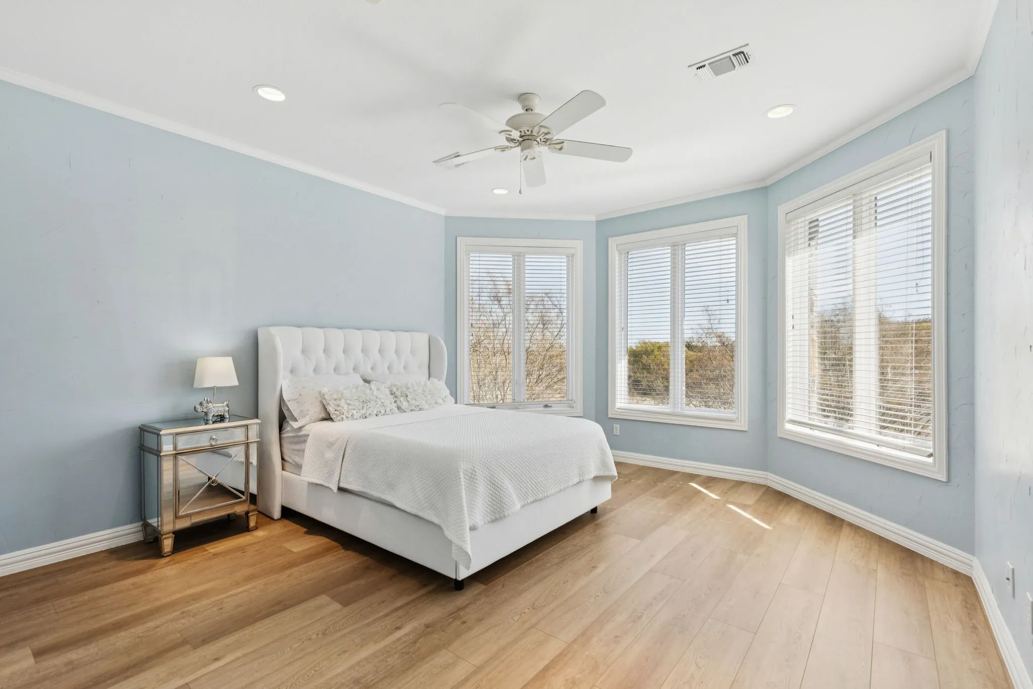 Bedroom featuring wood-finish flooring, recessed lighting, and a ceiling fan