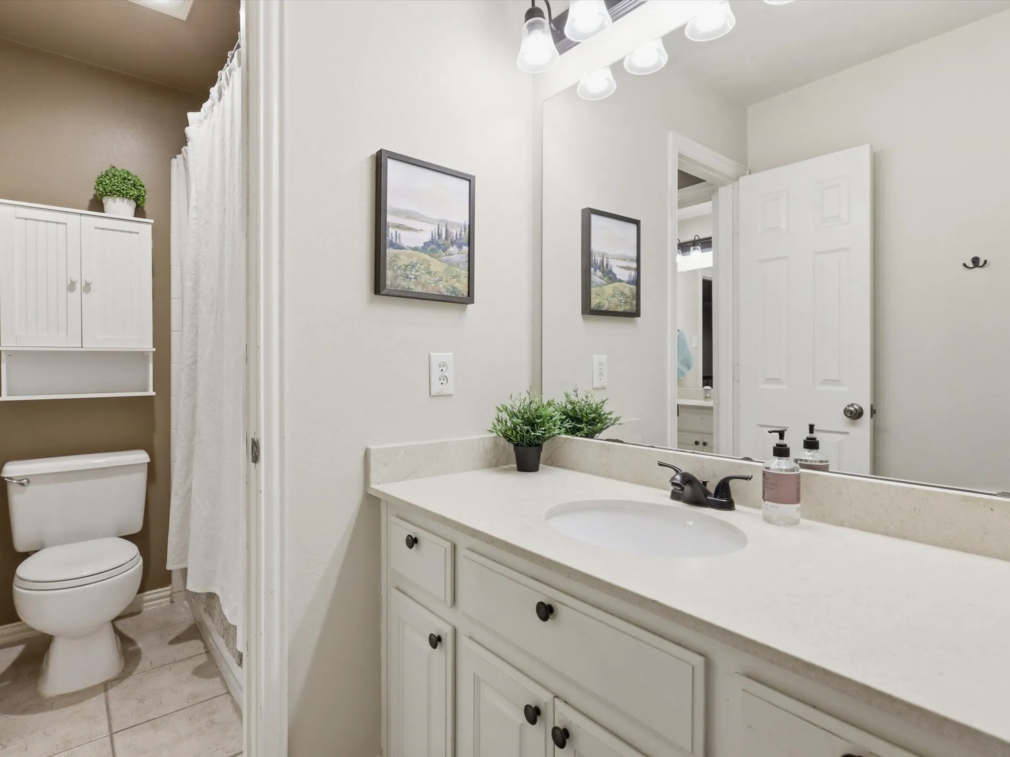A jack and jill bathroom situation upstairs.
